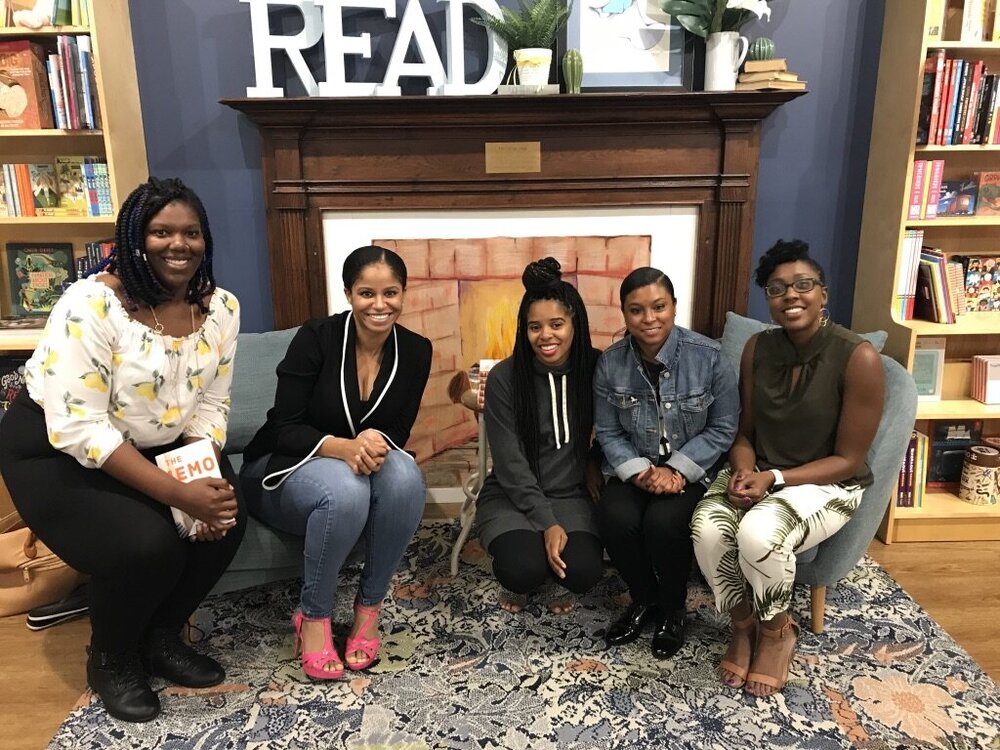 A book club meeting at the non-profits retail space