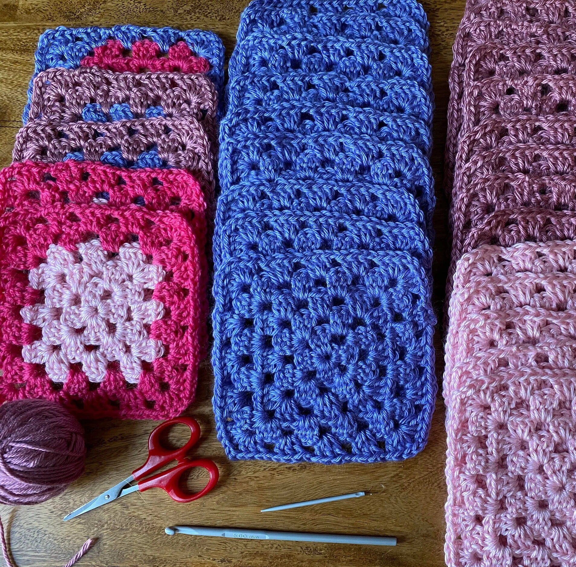 Using up the yarn scraps to make granny squares for compassion shawls and blankets