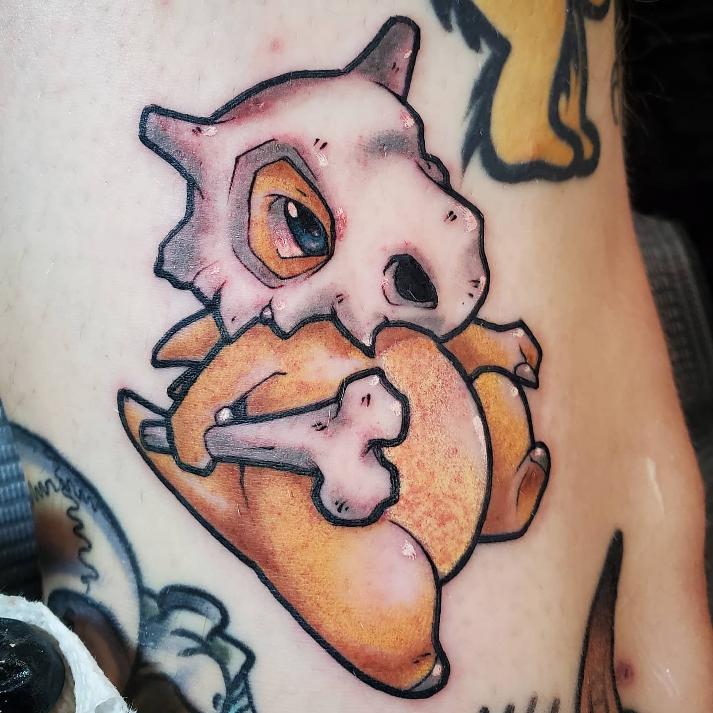 I did a cubone tattoo on a good friend of mine OC  rpokemon