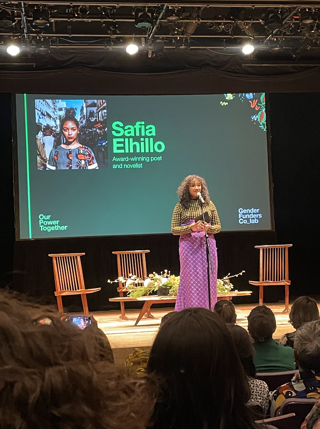 Safia Elhillo reciting a poem at a Commission on the Status of Women (CSW) event hosted by Gender Funders Co_lab in NYC in 2024.