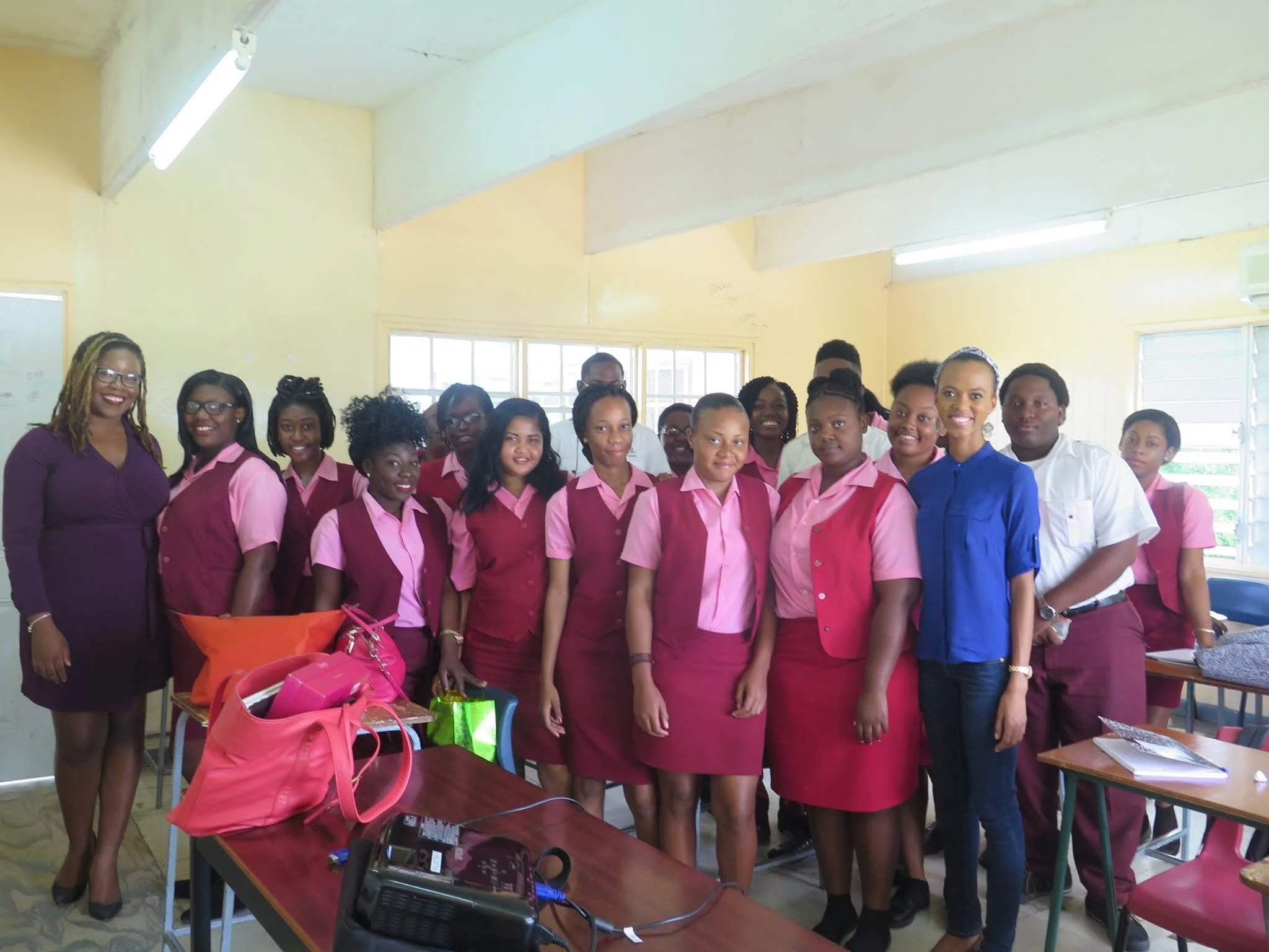 Intersect co-founders Nneka Nicholas and Sarah-Anne Gresham with students at the Antigua State College in 2016.