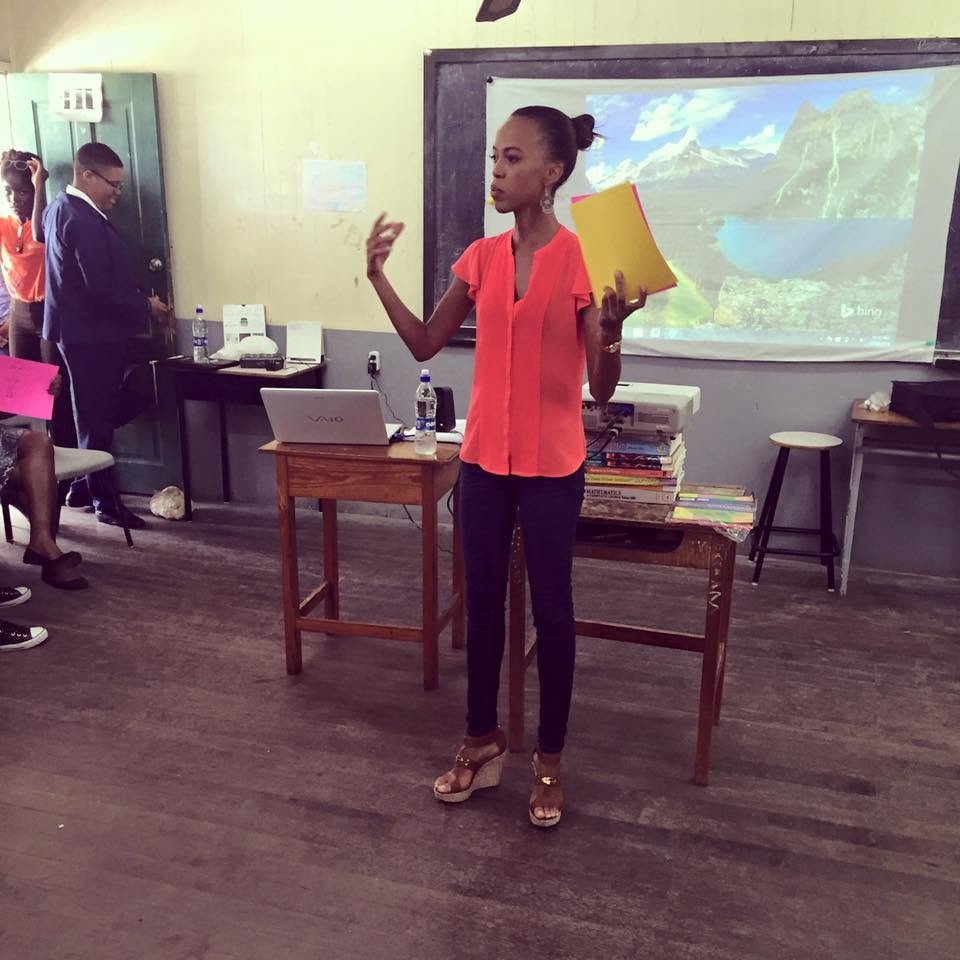 Sarah-Anne Gresham in an age-appropriate discussion about GBV and sexuality with students of the Antigua Girls High School for their annual "Girls' Day" event in 2015.