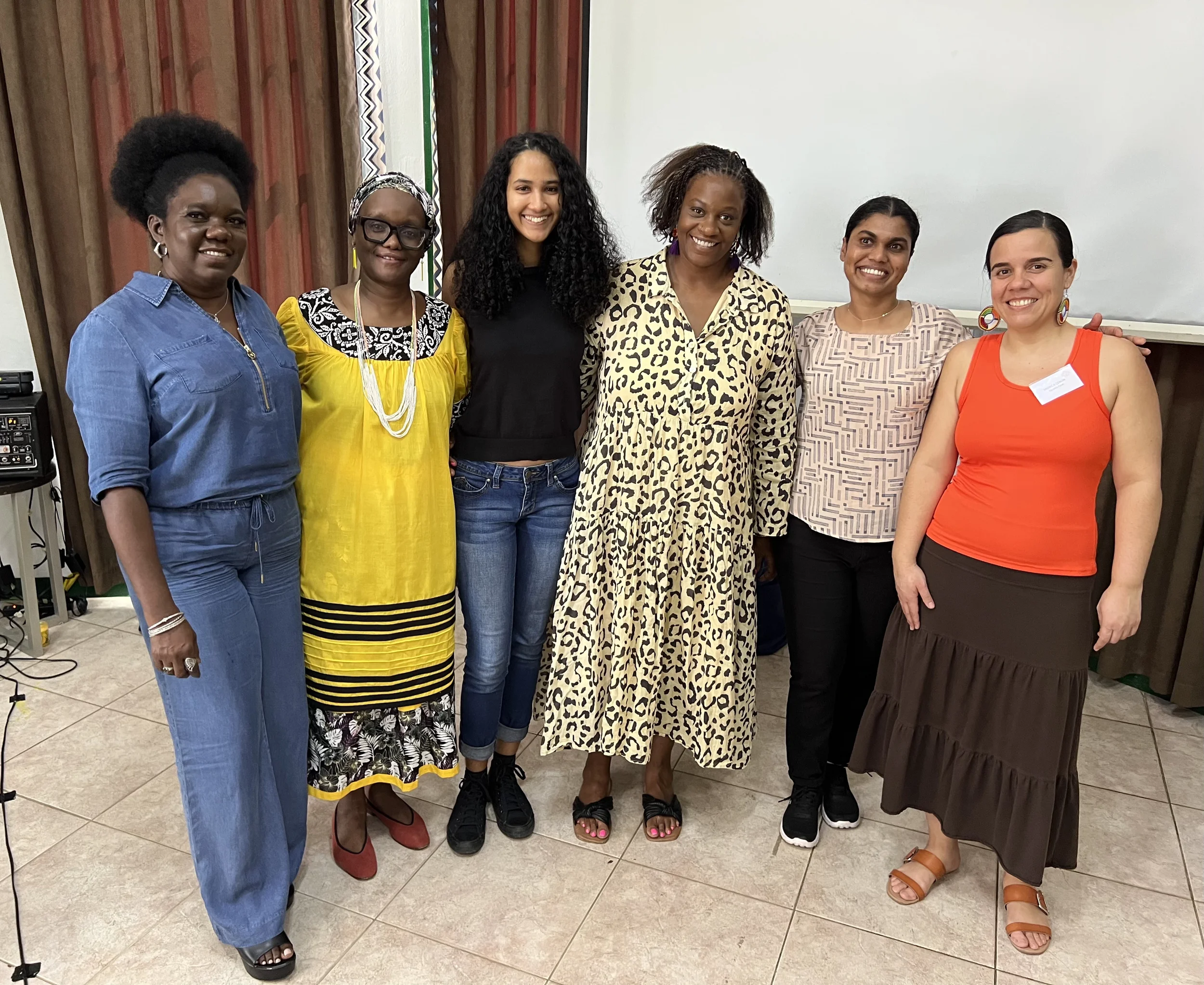 Intersect's resident artist, Lucia Murray (LEM) with fellow attendees, including Joy Marcus (Red Thread), Cynthia Eyakuze (The Equality Fund), Tamara Huggins (The Equality Fund), and Alessandra Hereman (The Astraea Foundation), at WVL-Caribbean’s End