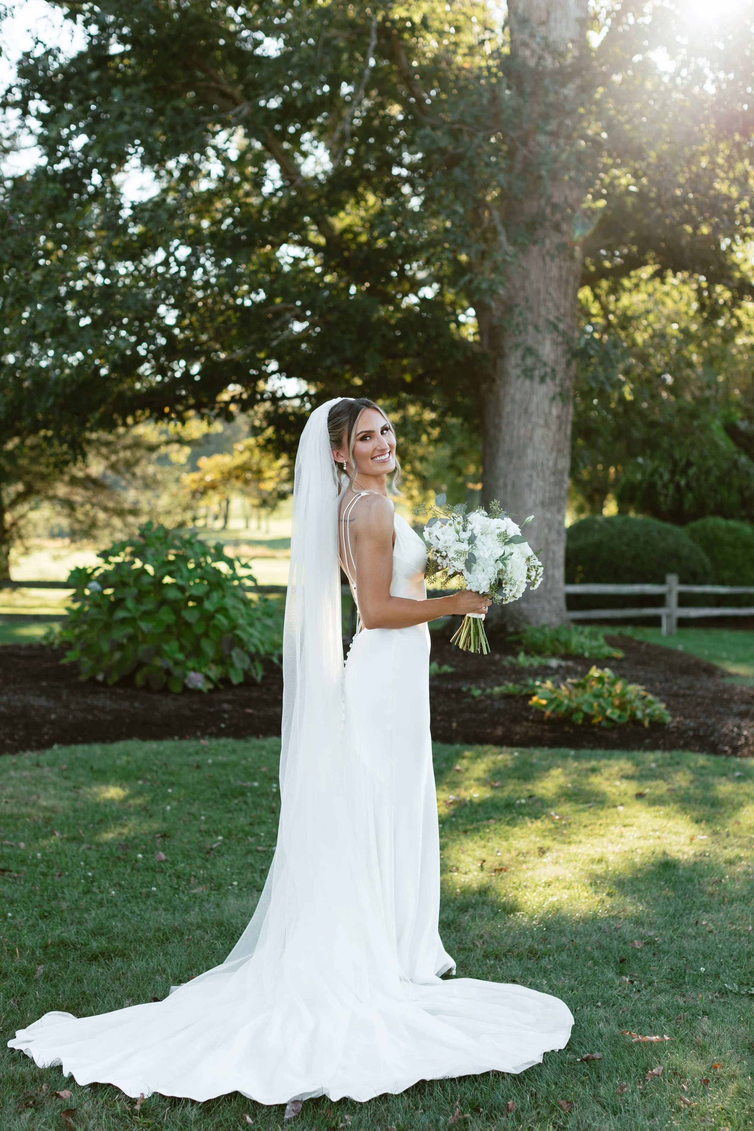 Solo bridal portrait in the gardens at the Villa