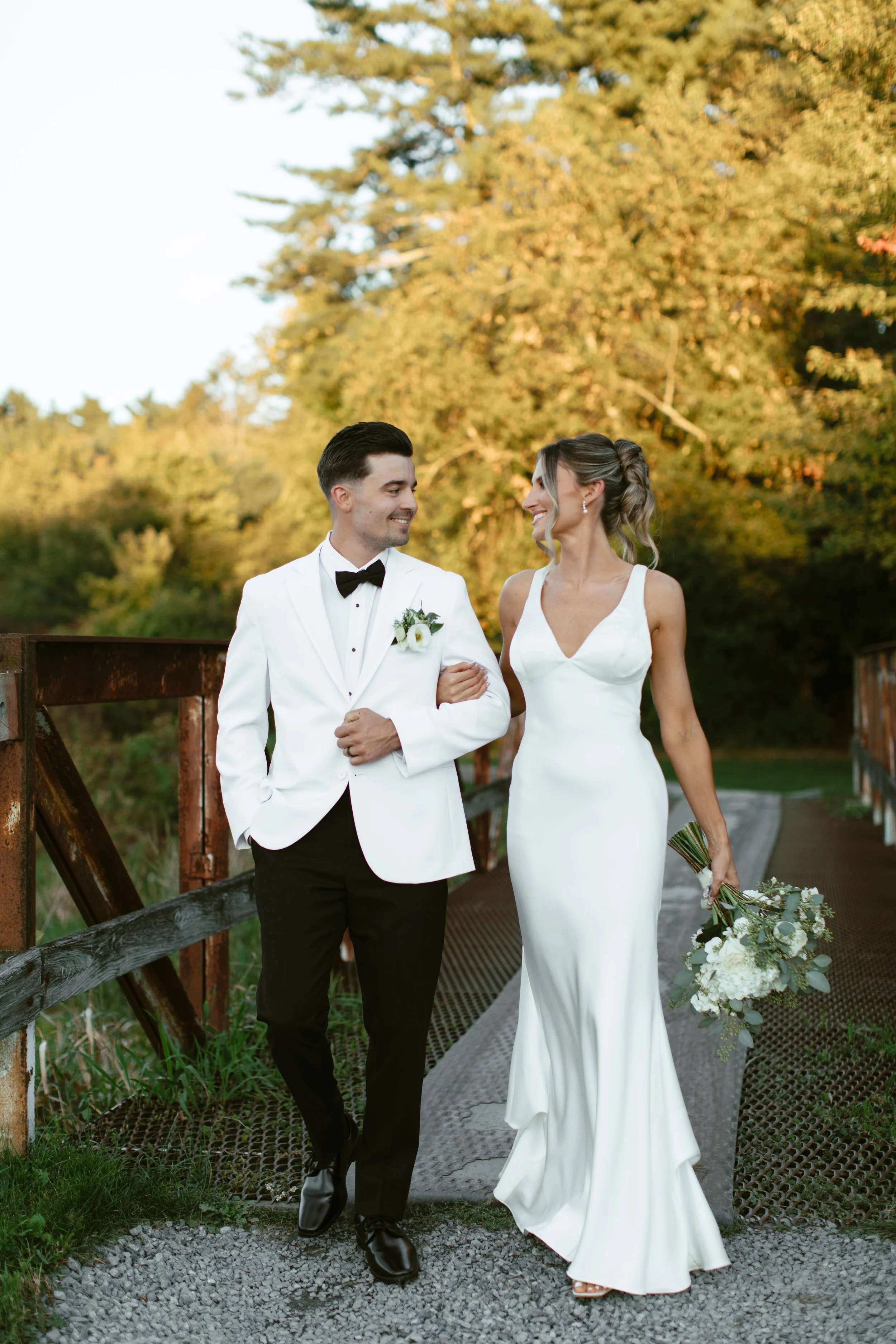 Wedding couple portraits in the greens during sunset at the Villa