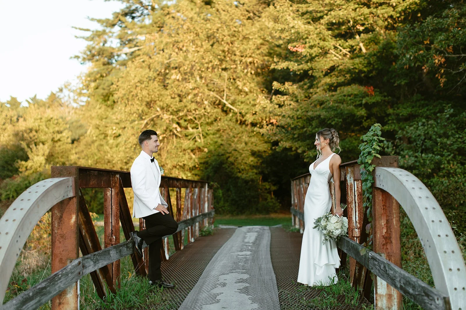 Wedding couple portraits in the greens during sunset at the Villa