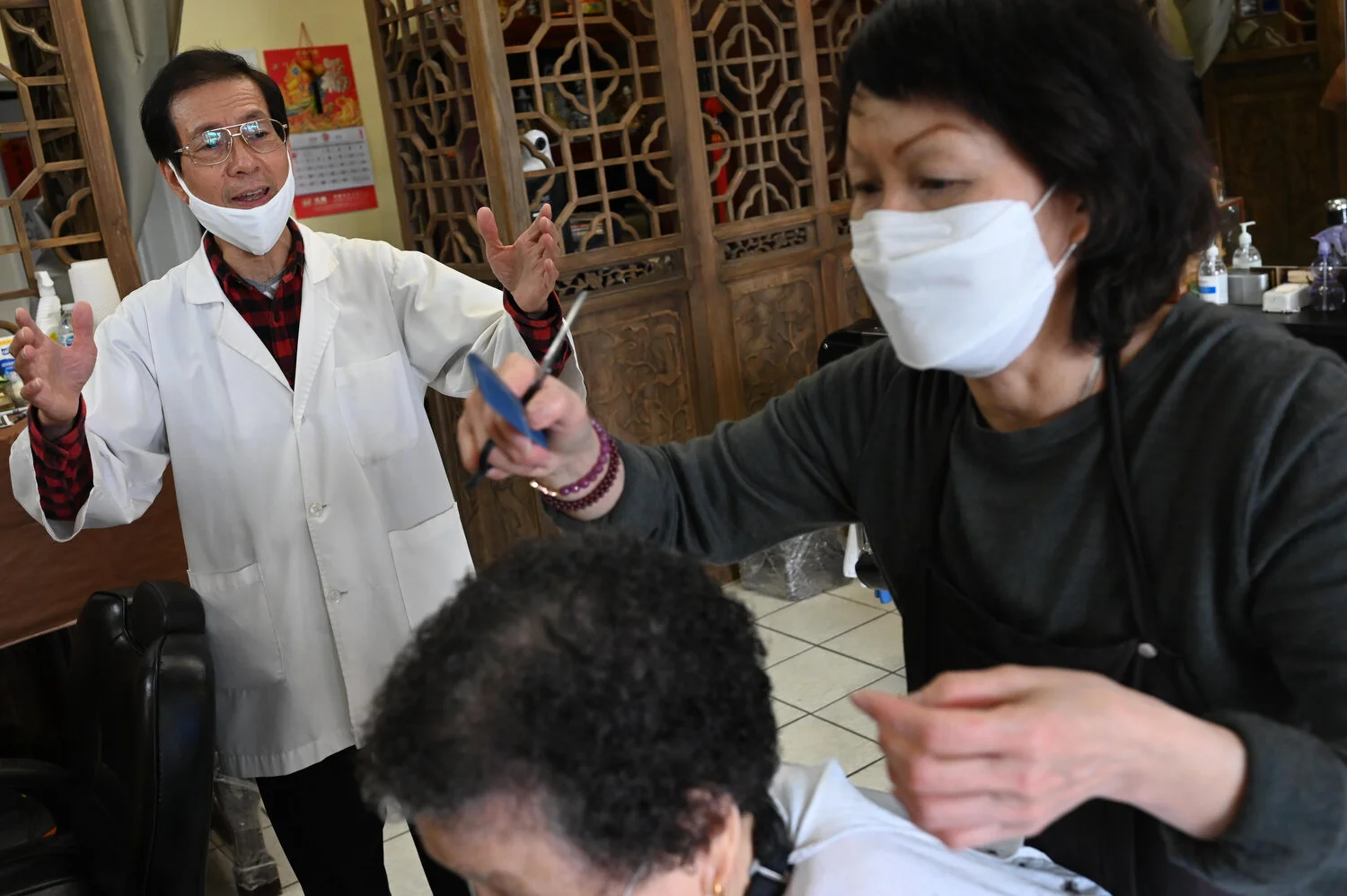  After returning from a two hour lunch date with a friend, Wong is describing to his business partner, Wendy, the long lines he encountered before being seated. Wong and Wendy decided to share this shop space together after the building that had hous