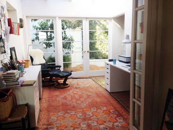 sunny skylight office/art studio opens to front patio