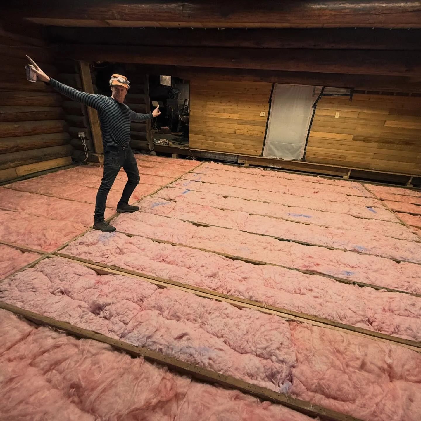 Winter of 2025 was beginning to set in, but this year the lodge wouldn&rsquo;t just be a freezing ice box. We set wire in between the floor joists to cradle fiberglass insulation up against the future sub floor. The change at first was minor but stil