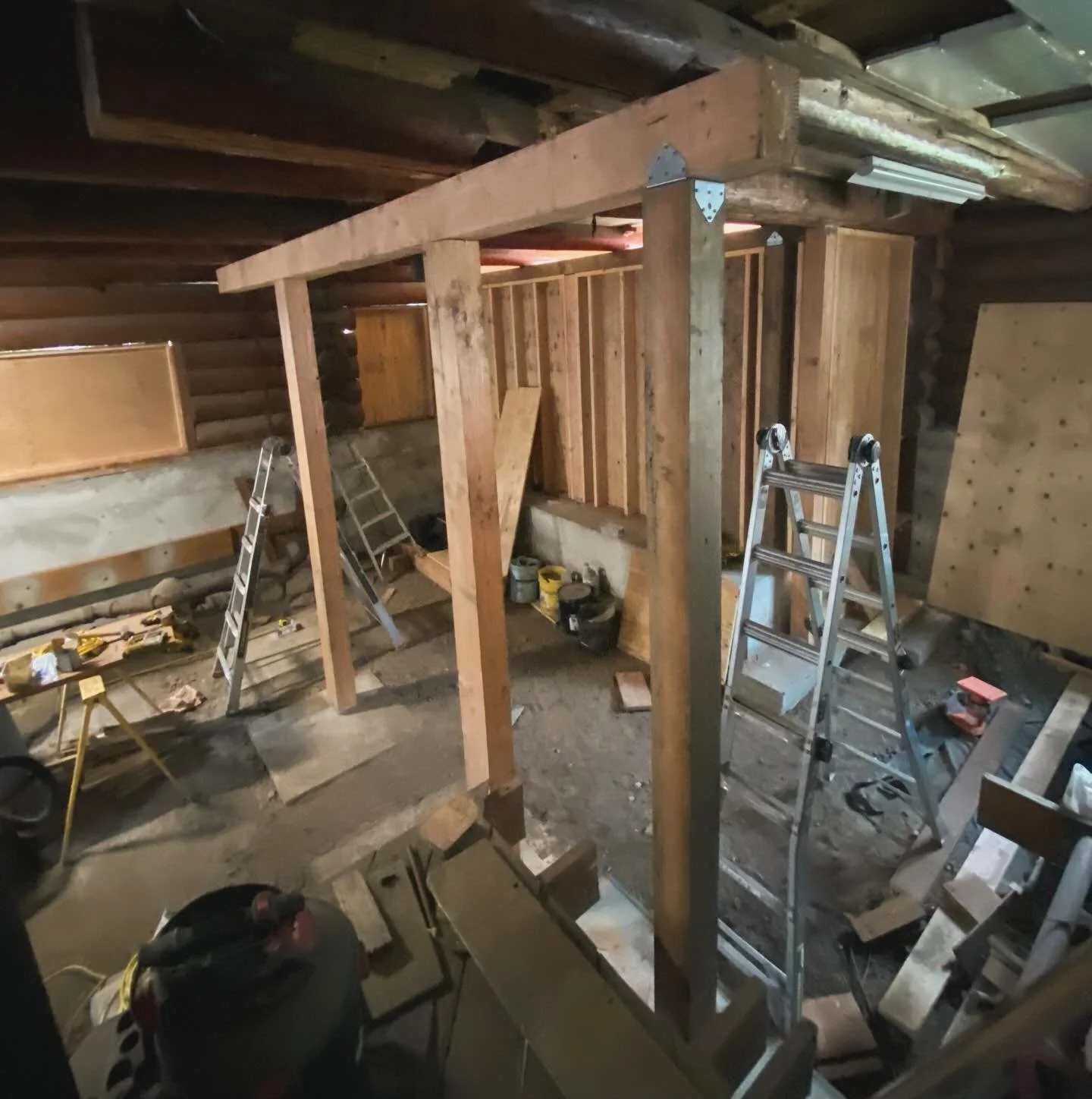 We decided to reinforce this section, where the restrooms will eventually live, with a massive 6x8 inch beam. Posts of the same size run right up to it from the subfloor making a sturdy Stonehenge like trilithon. It was a definite test of endurance a