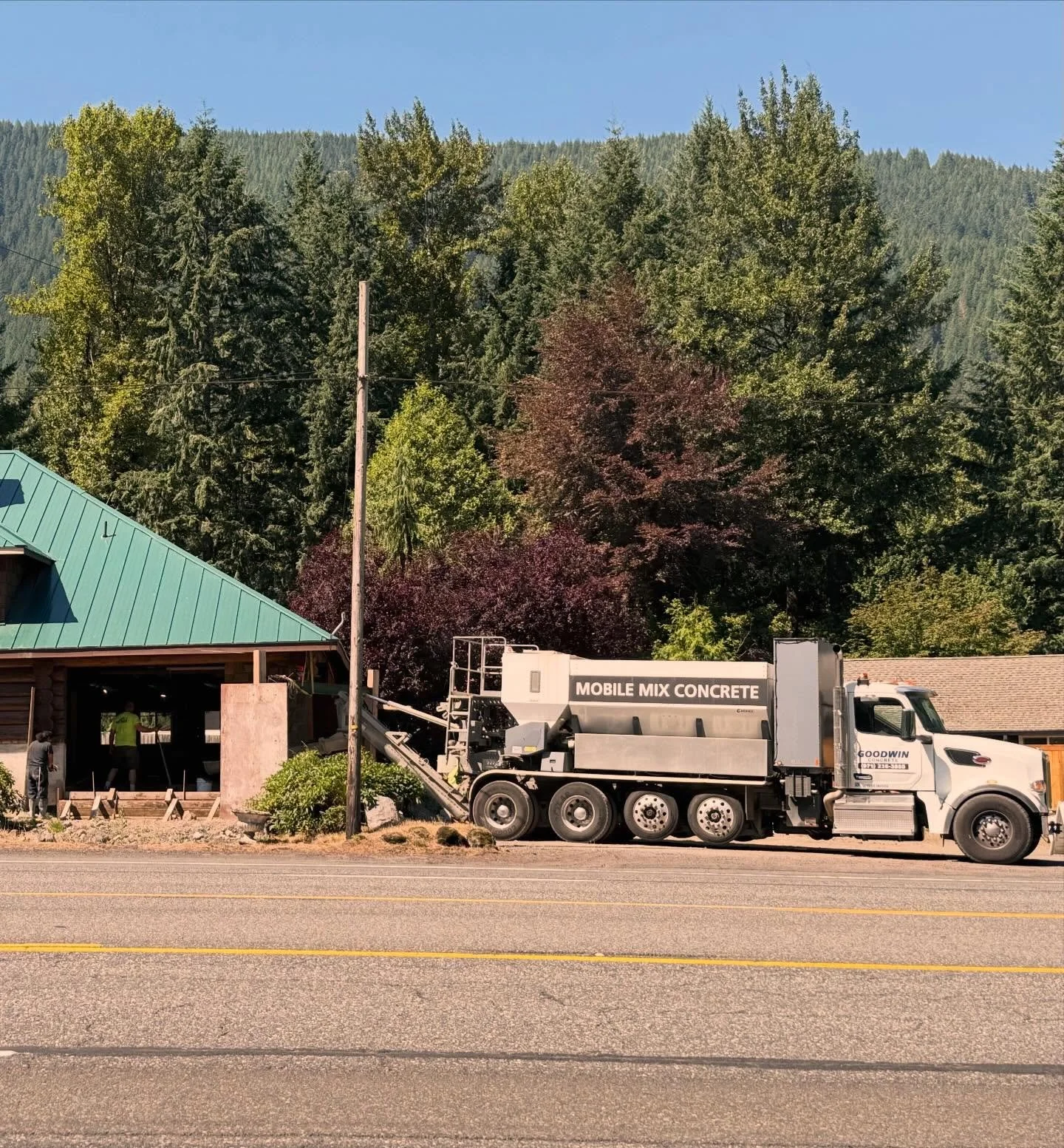 There had been a giant open hole at the entryway of the lodge ever since we decided to lower the floor. It was covered by a flimsy assortment of plywood and form board sheets in such a way that anyone with a screwdriver and enough determination could