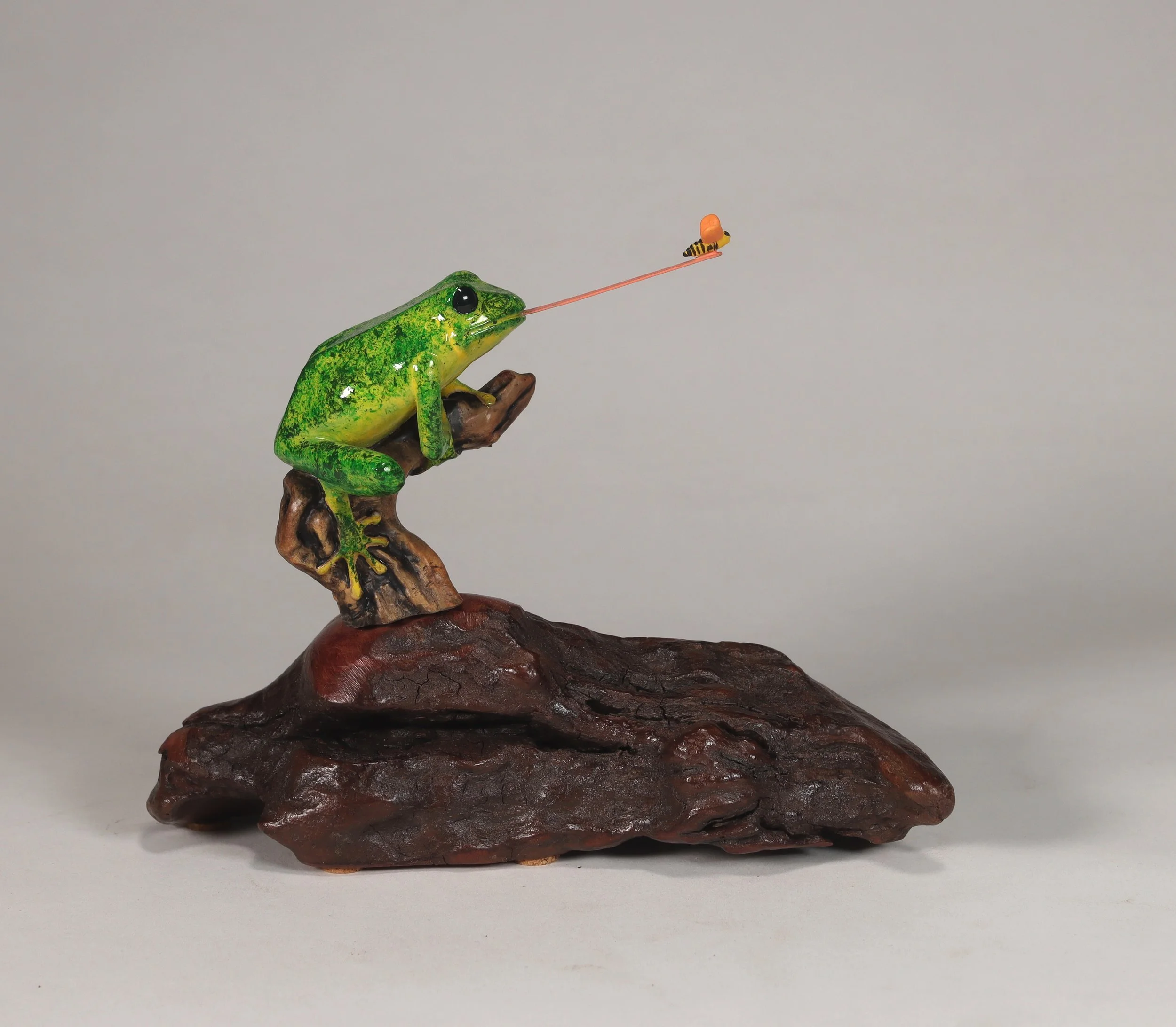 Fly-Catching Frog Sculpture Airbrushed 6in Long on Burlwood
