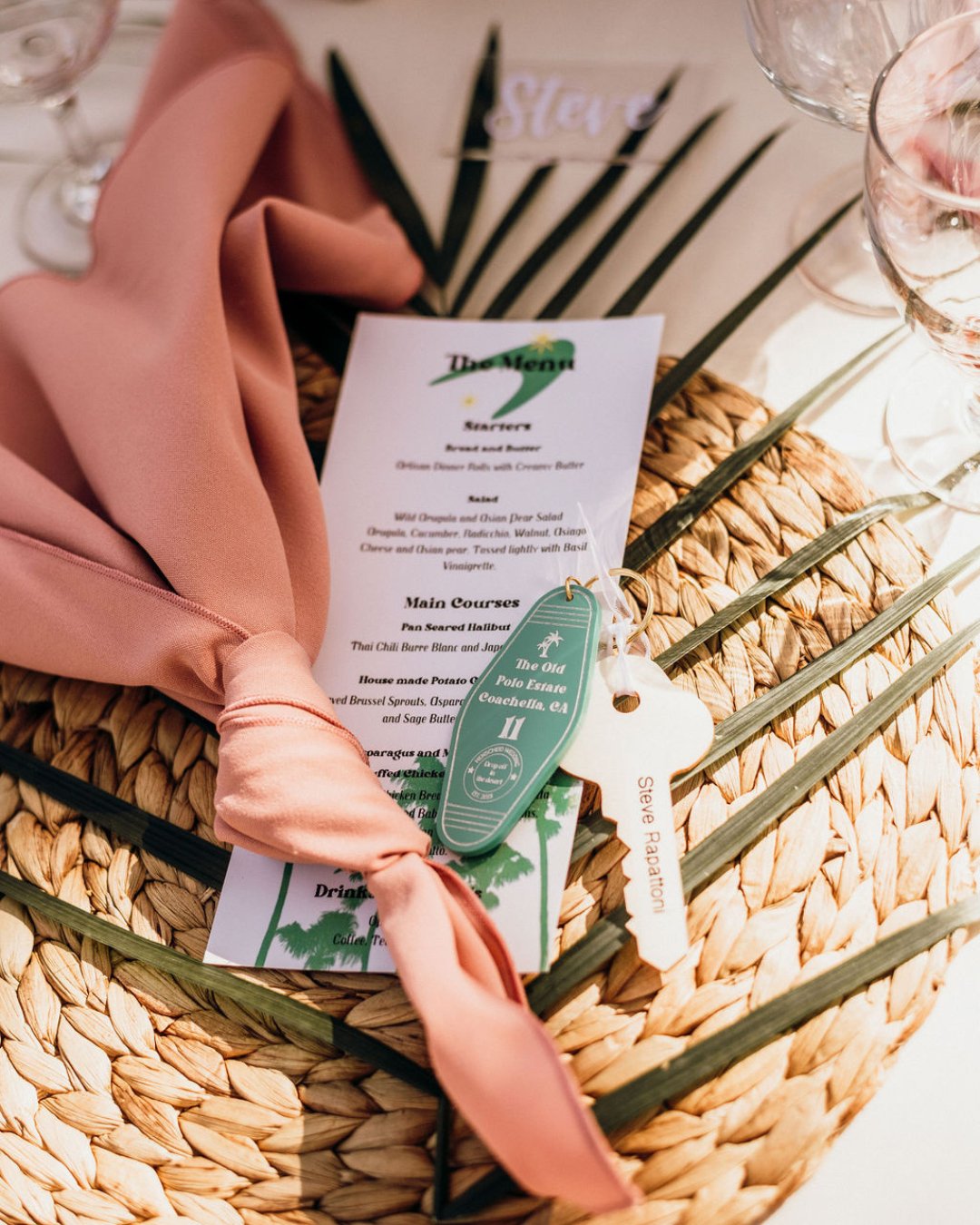 Transported to vacation mode with every detail! 🌴✨ From a seating chart featuring vintage-inspired key tags to a groovy peach and green palette, this reception was pure wanderlust. ⁣
Photo: @everydayforeverweddings⁣
Coordinator: @inspiredlifeevents⁣