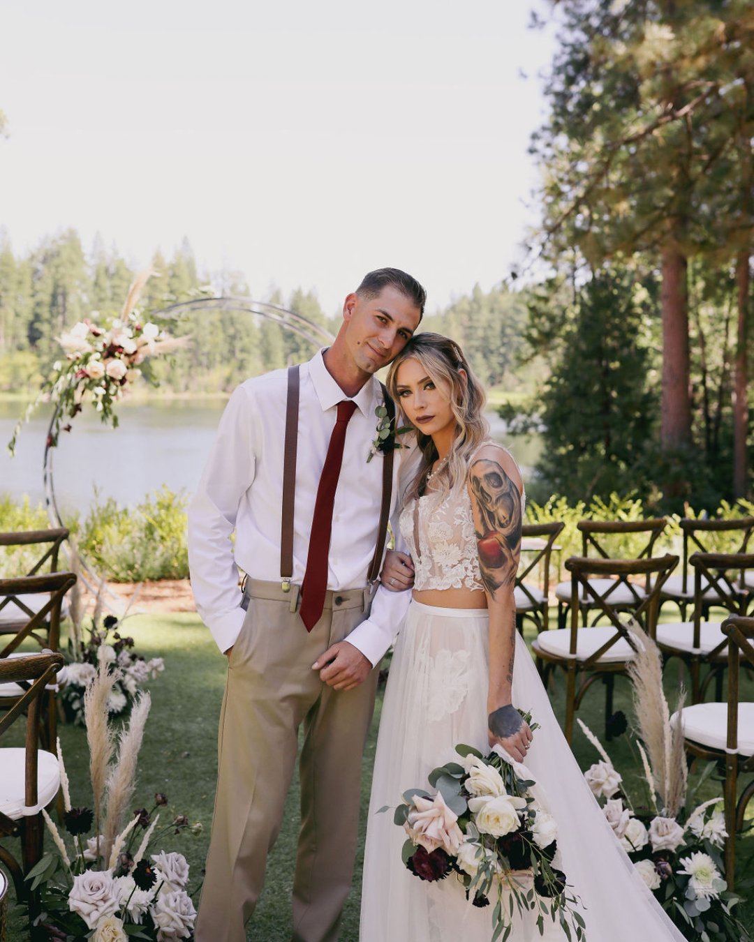 Tiffany &amp; Sean 🥂 This pair's romantic elopement featured bold roses &amp; plumes of pampas grass. Our favorite detail was Tiffany's stunner of a wedding dress &ndash; a two piece with a lace bodice and a flowing skirt with a long train. ⁣
Photo: