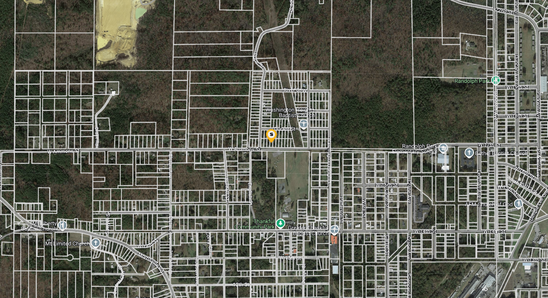 Wide, open property for sale in Anniston, Alabama, ideal for residential or recreational development.