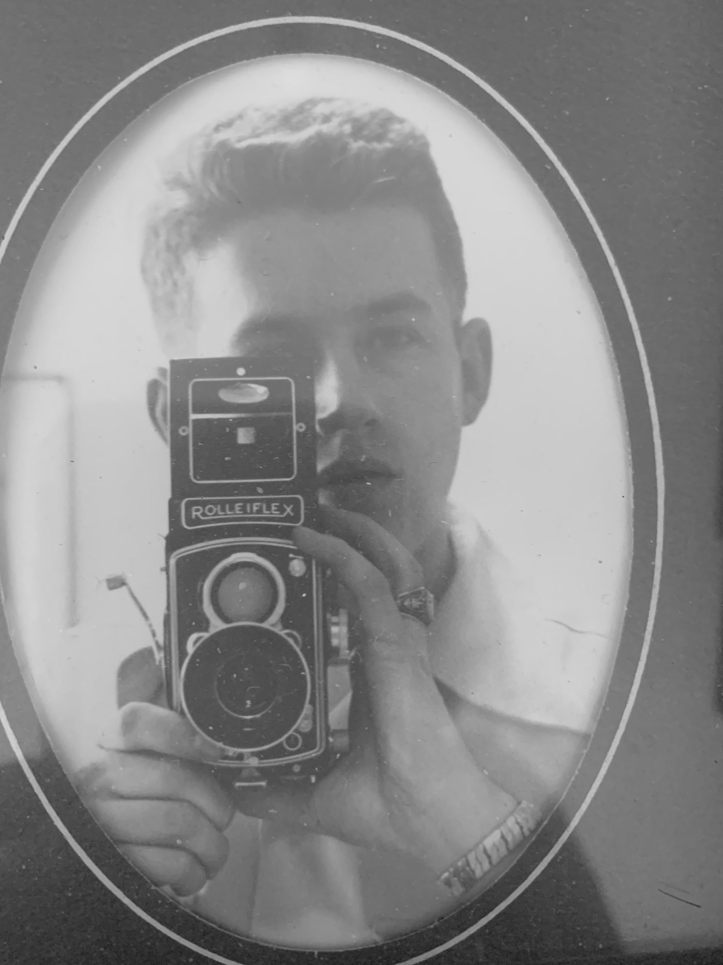  my maternal grandfather posing with a camera as a teenager 