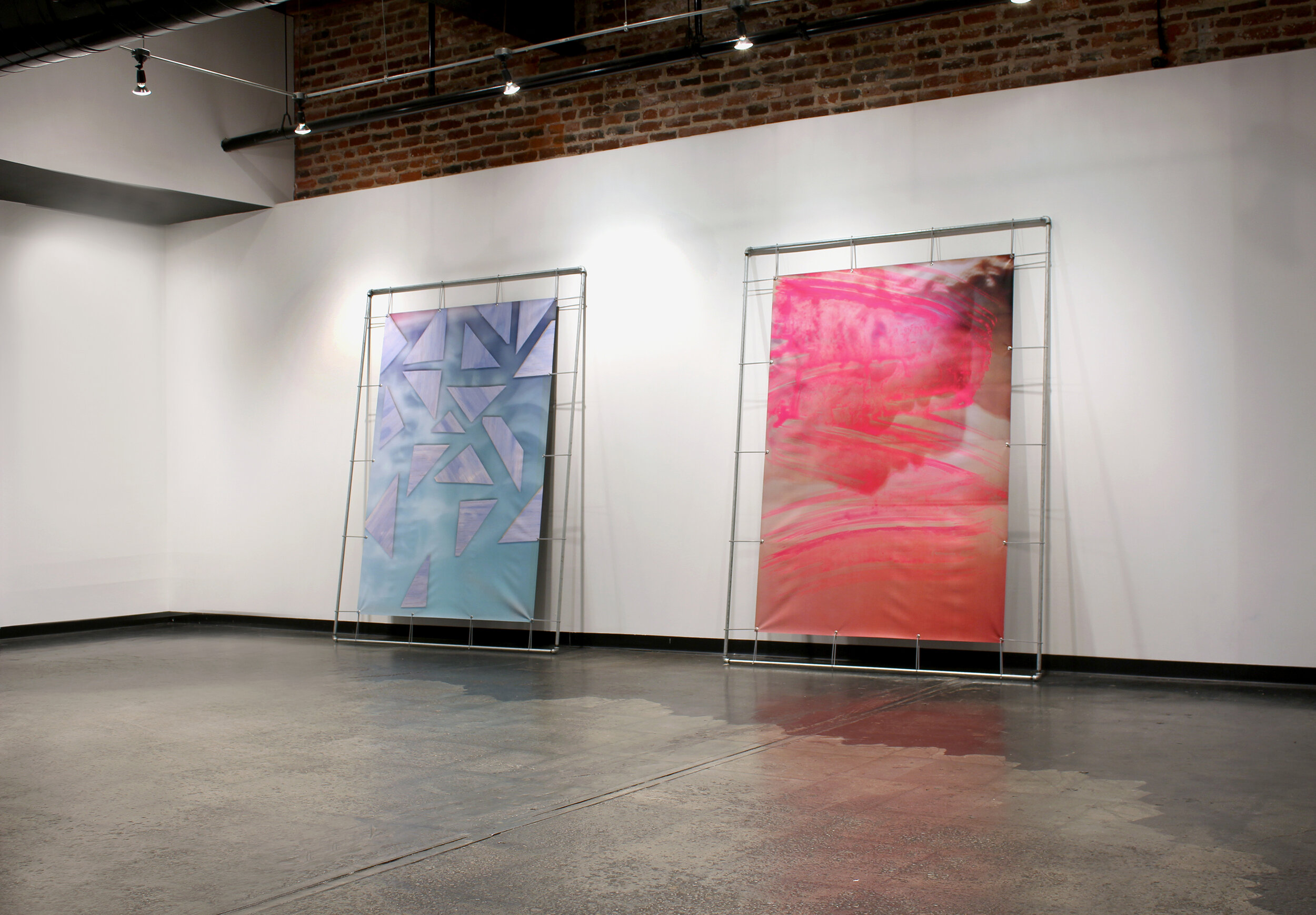   Blue Fade and Pink Wash (Remix) , with Brian Barr, 2017, installation view, Nothing Beside Remains Archival digital prints on vinyl, zip ties, steel pipe Each 96 x 72 inches Collaboration with Brian Barr  