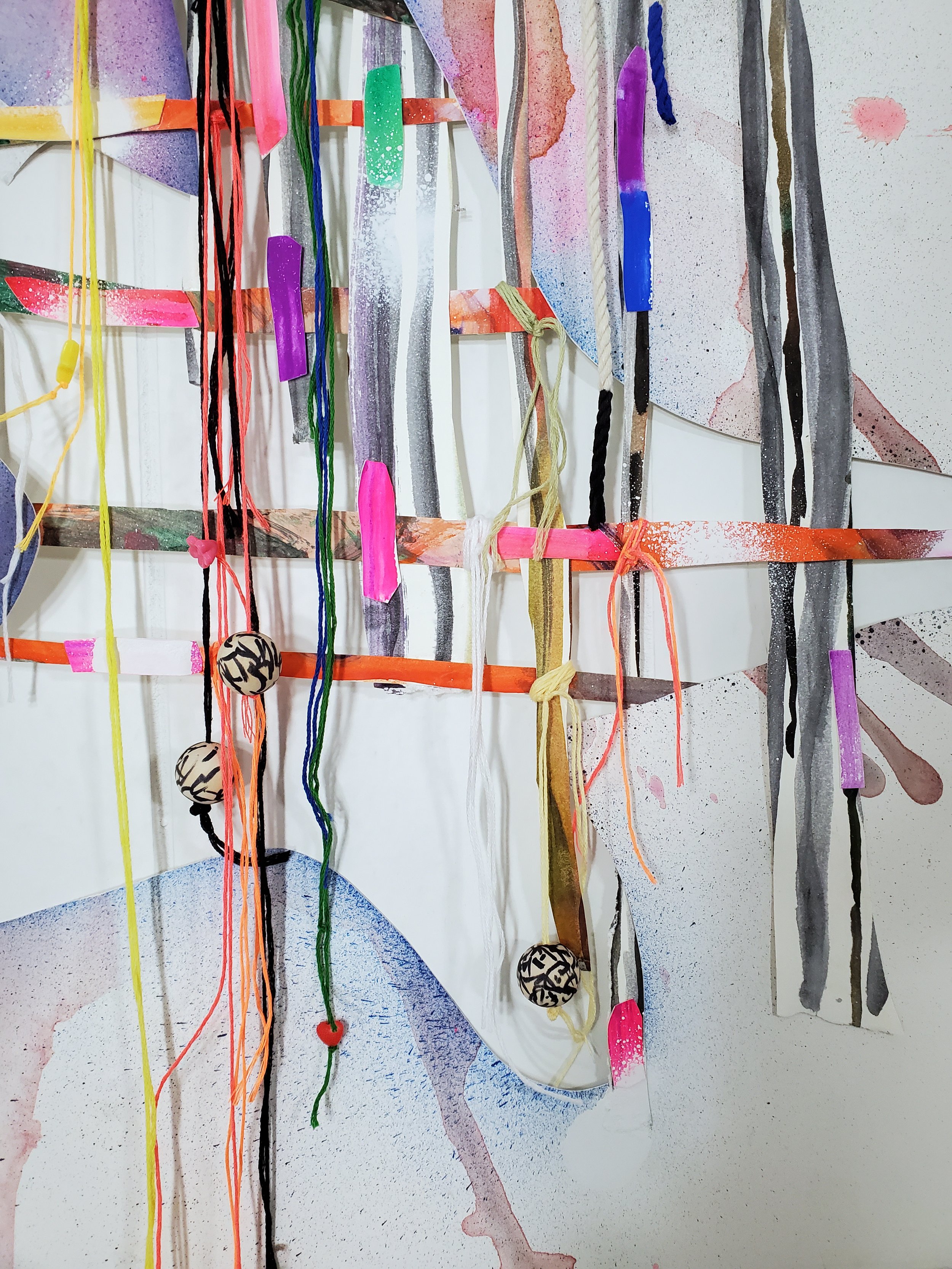   Star-Crossed , 2024, detail Spray paint, acrylic, gouache, flashe, cotton twine, embroidery floss, found string, sharpie, colored pencil, wood beads and plastic beads on hand cut and collaged paper 27 1/2 x 46 inches 