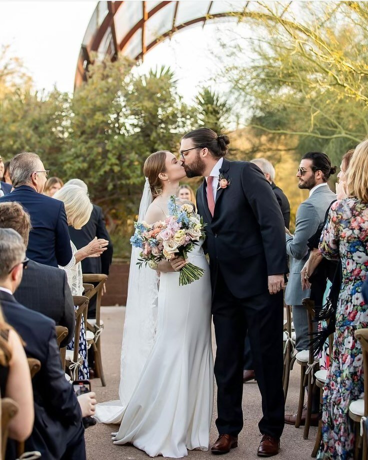 Tara and Chris's weddings has us spinning tunes amidst the enchanting beauty of the Dessert Botanical Gardens 🎶🌵 Can you imagine a more magical setting to celebrate love than surrounded by towering cacti and vibrant succulents? From romantic ballad