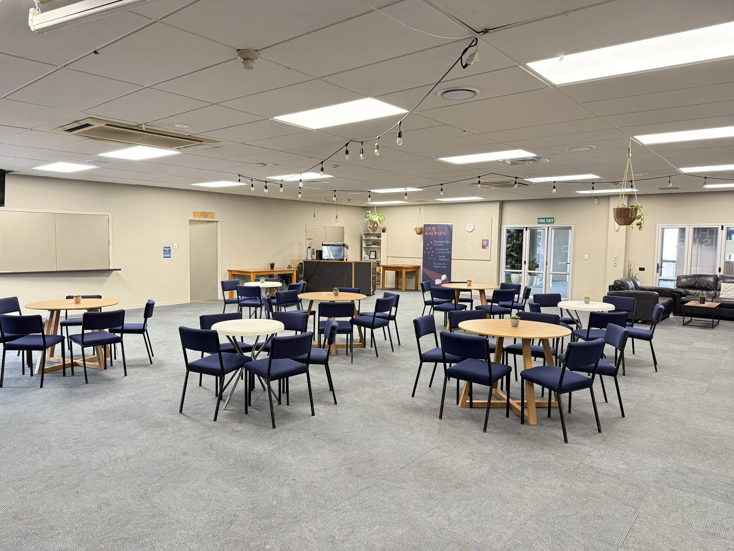 Matai Lounge - with space for 100-150 seats for performances, adjacent to the kitchen, so often used for a dining room. With plug and play sound system and big screen. Venue available for bookings or hire in Palmerston North.