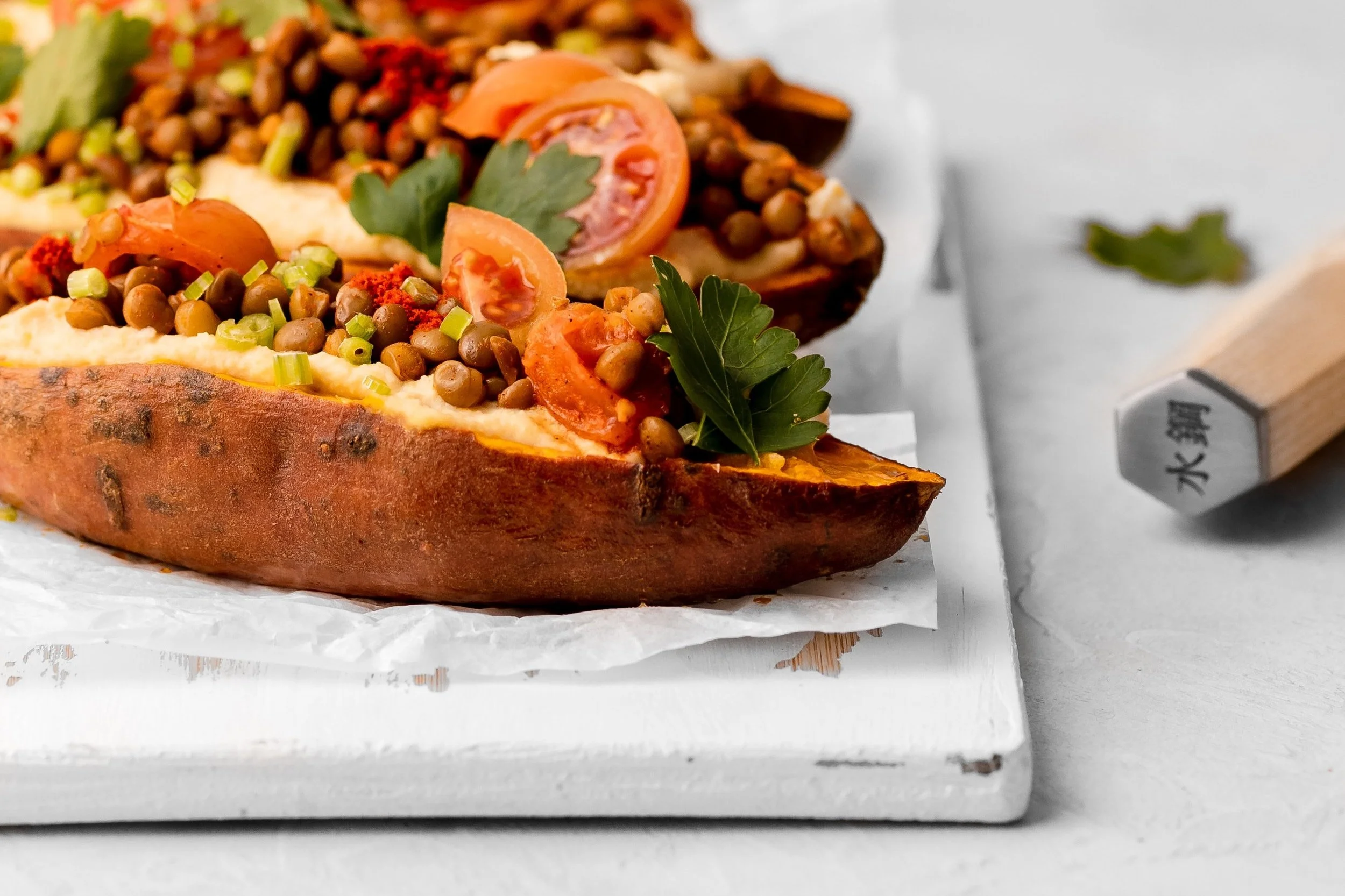 Loaded Sweet Potato with Hommus &amp; Cherry Tomatoes