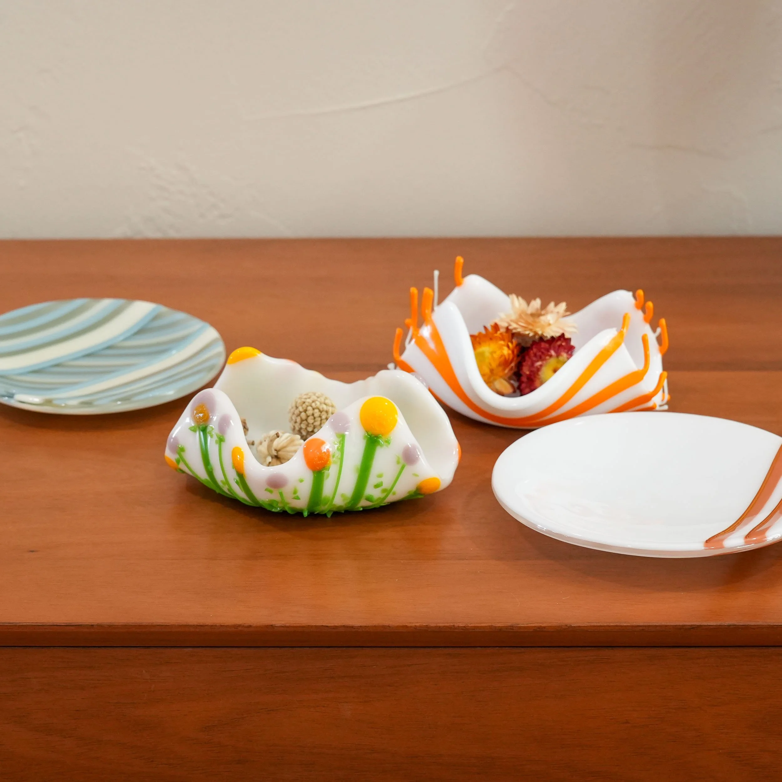 Slumped and draped fused glass art pieces made by Glasswork Pixie®