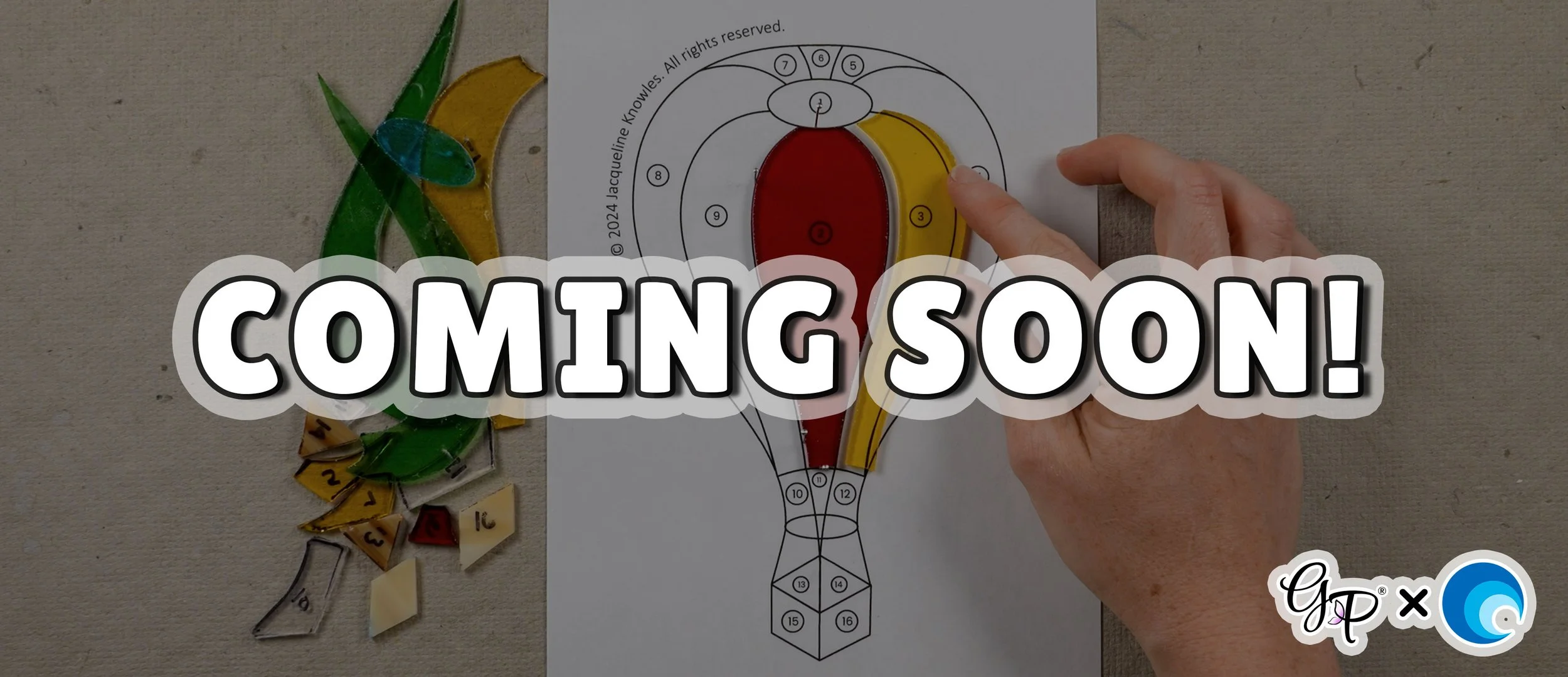 Hands fitting together shaped stained glass pieces on top of a pattern with 'COMING SOON' text overlay