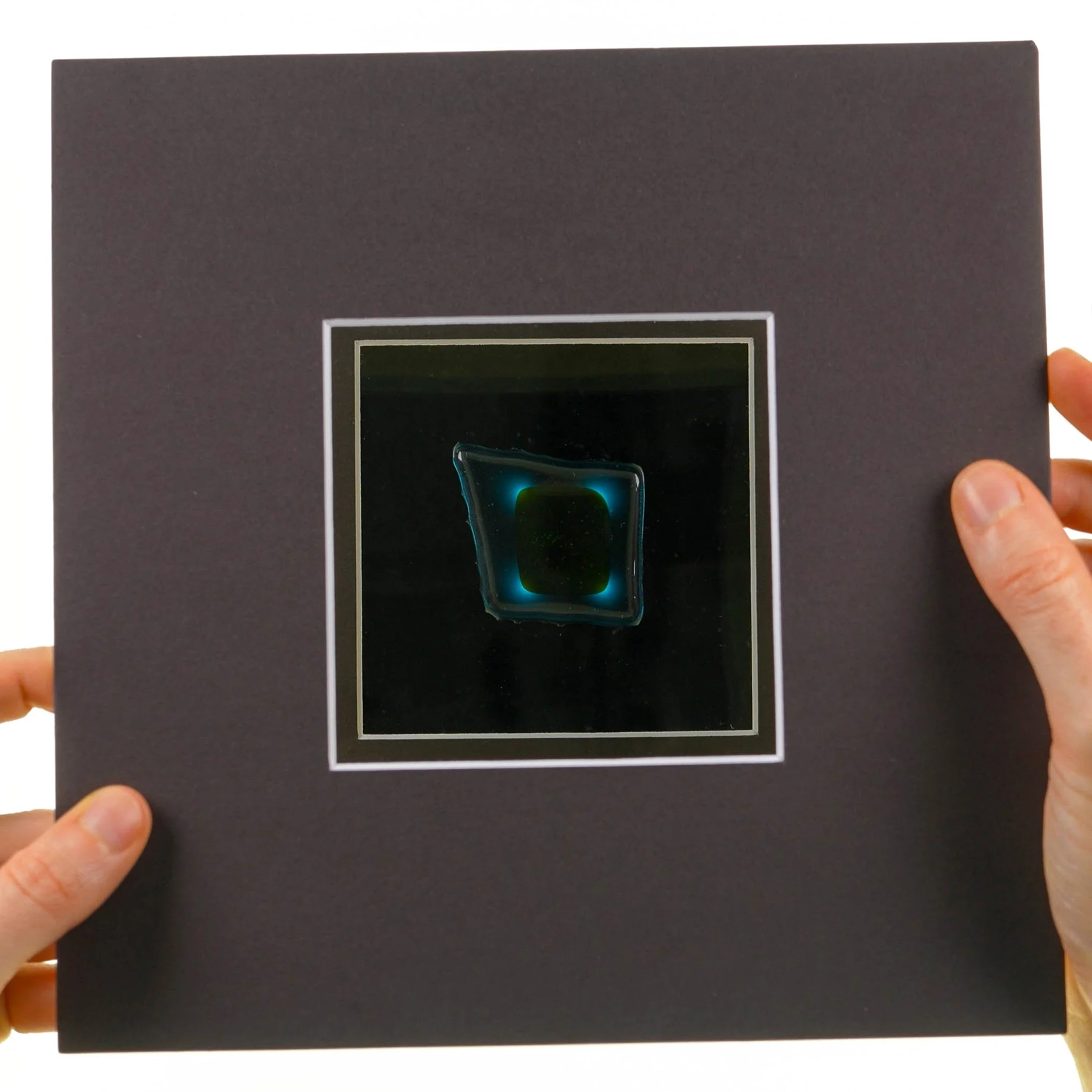 Incompatible fused glasses viewed through polarization filters