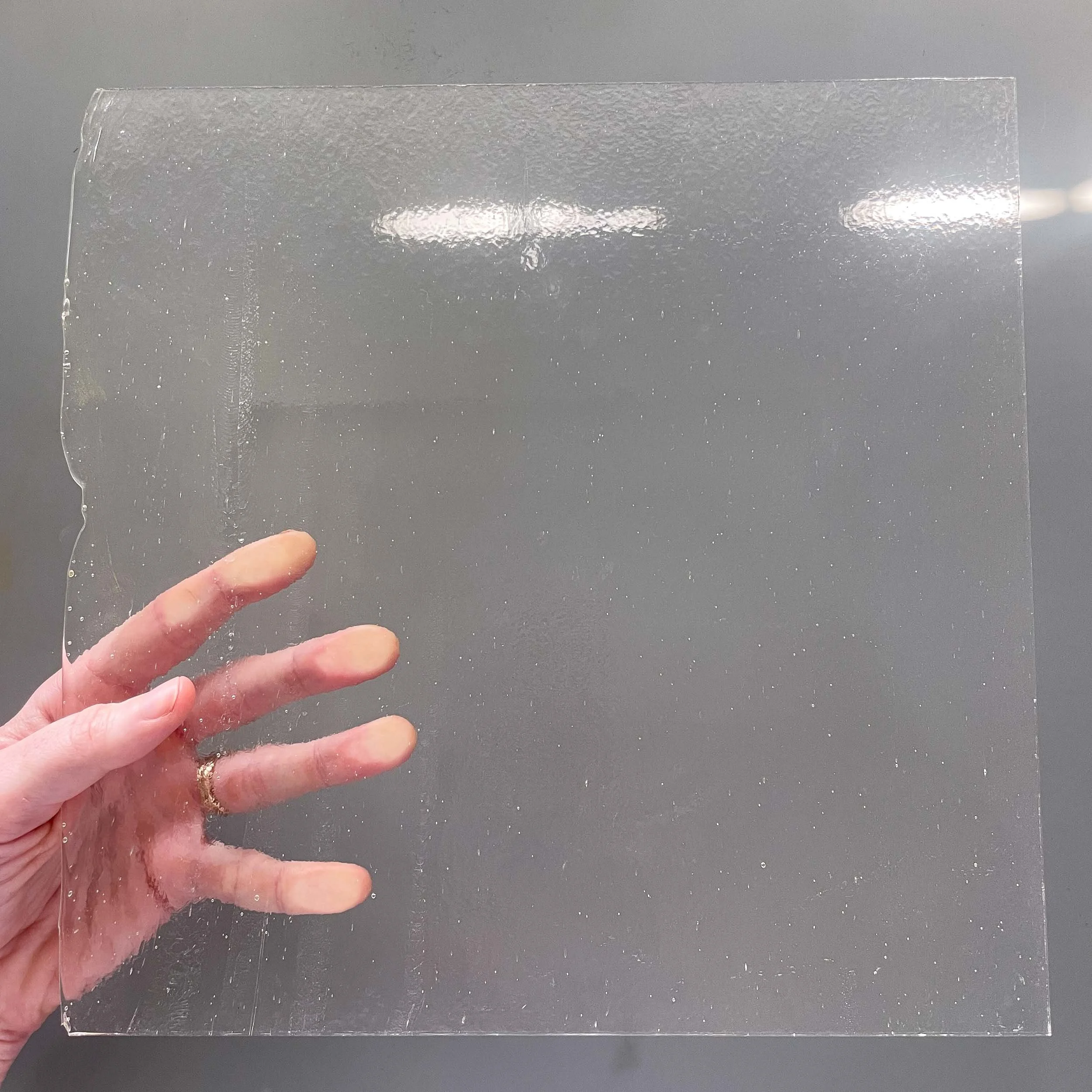 A clear sheet of stained glass, made without lead