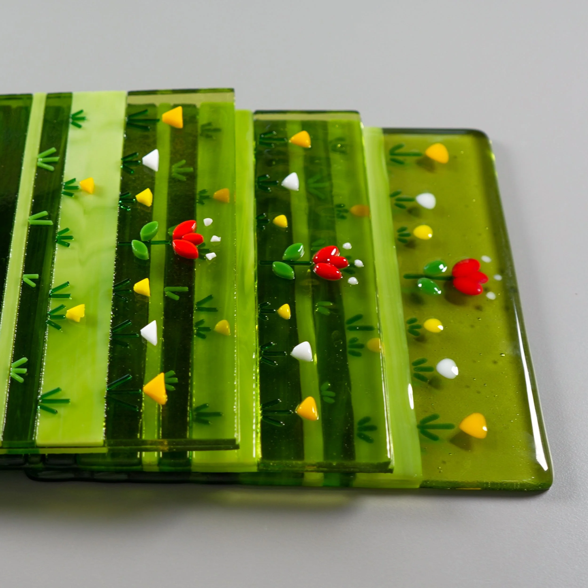 Tack, contour, and full fused glass 'Flower Garden' art pieces made by Glasswork Pixie®