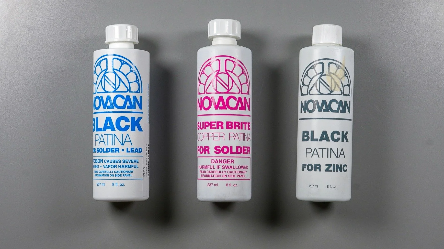 Three bottles of patina: black patina for solder, copper patina for solder, and black patina for zinc