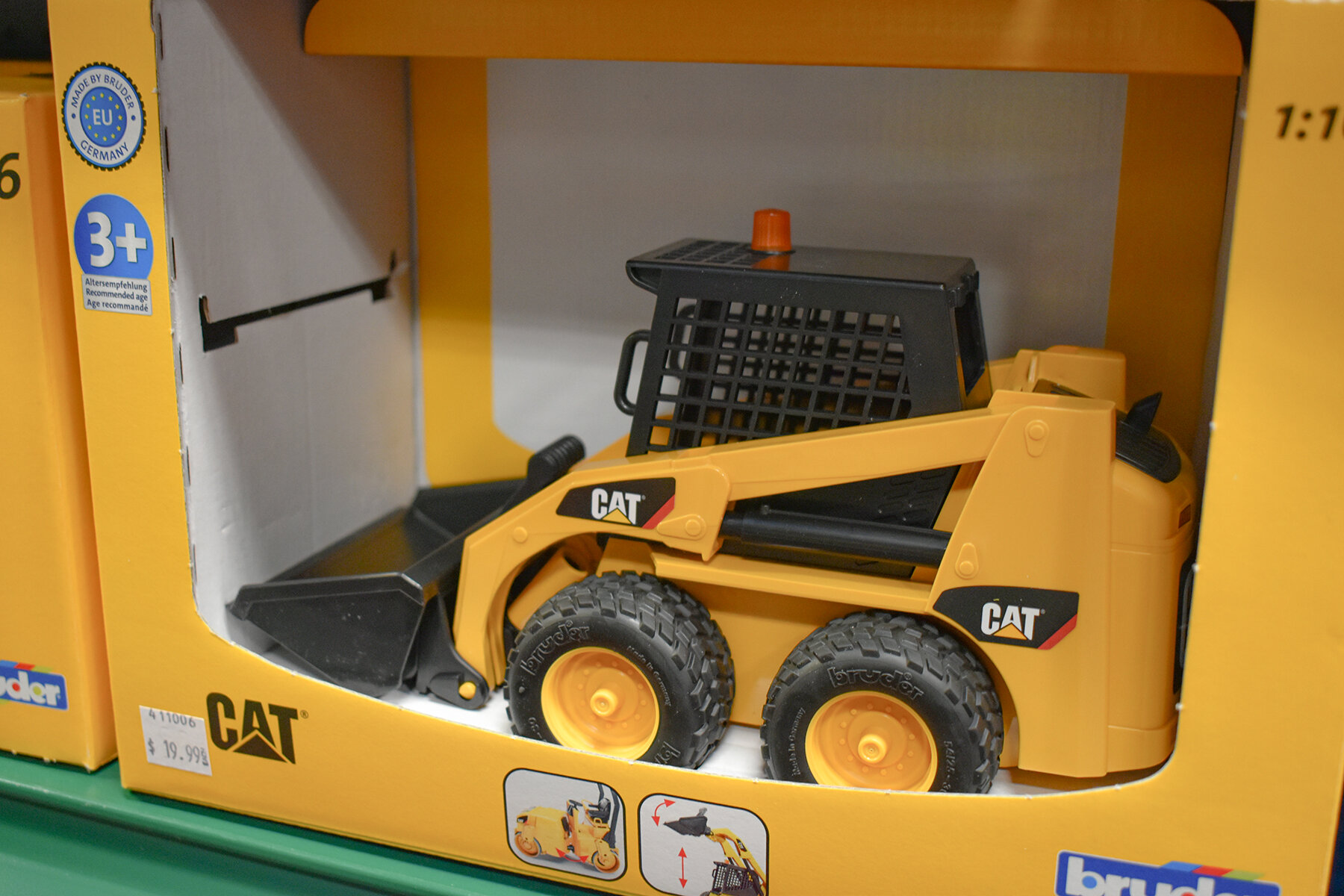 Phillips Toy Mart Bruder CAT truck.JPG