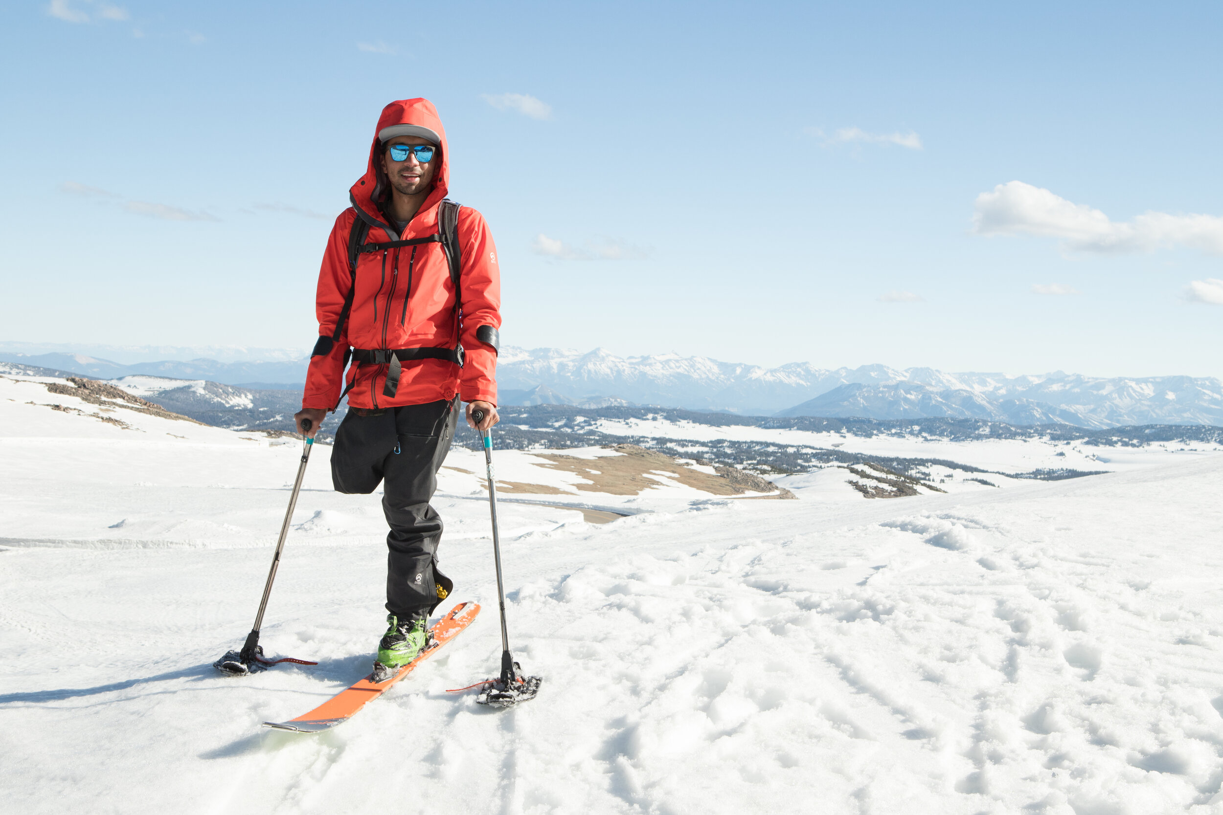 Vasu on a mountain with his ski