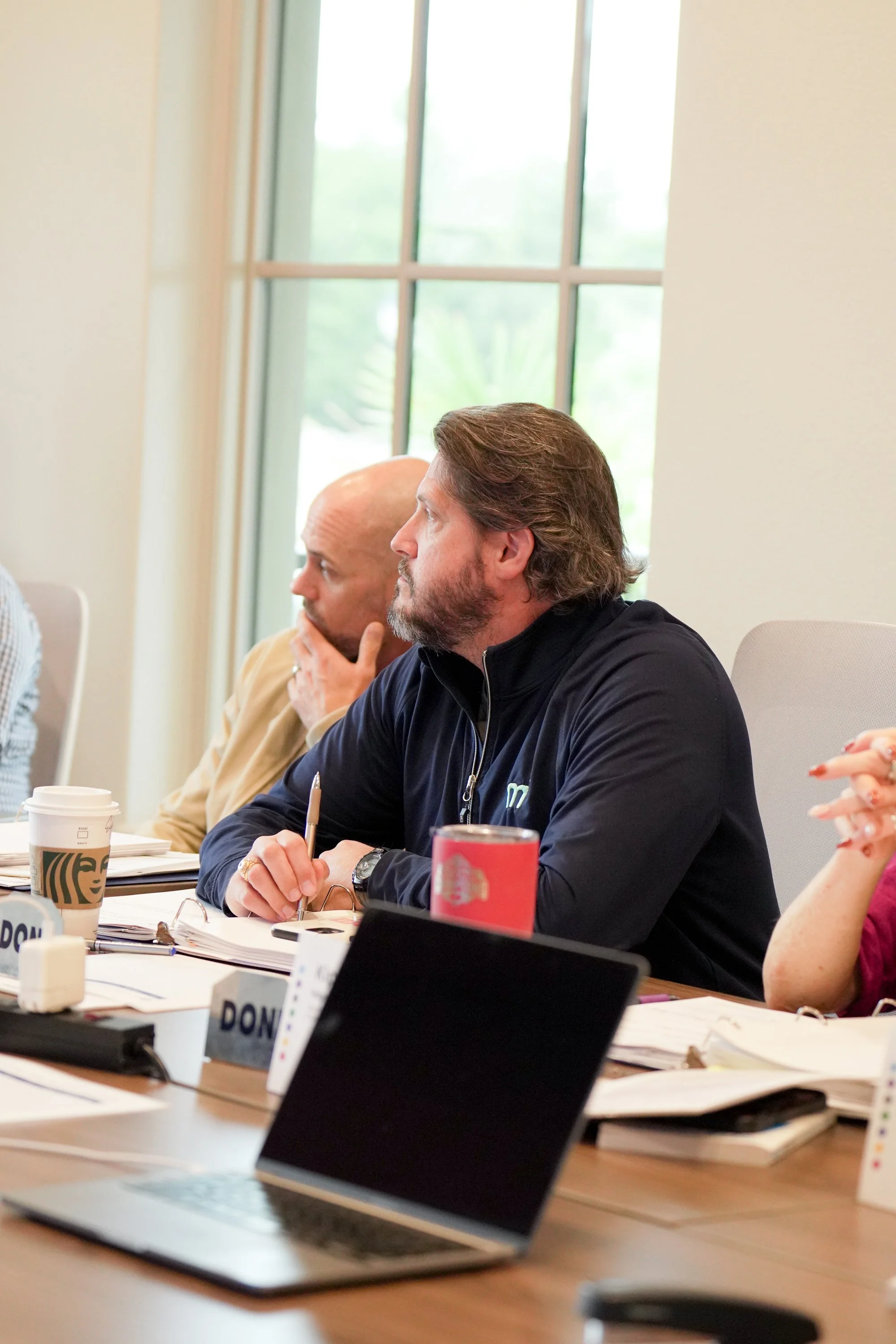 Executive team gathered for a planning meeting at their Dallas office