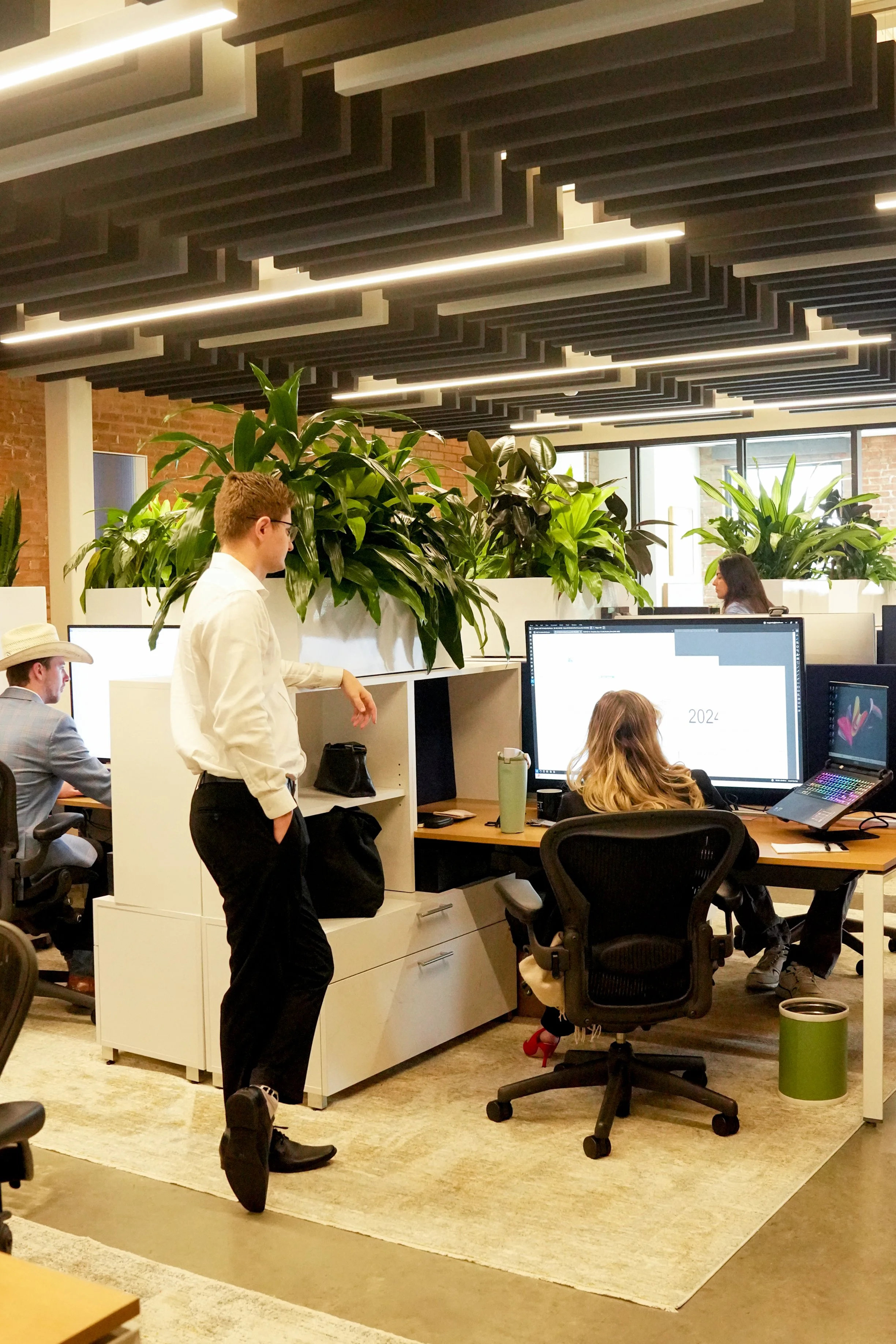 Engineering team collaborating on a project inside their Dallas headquarters