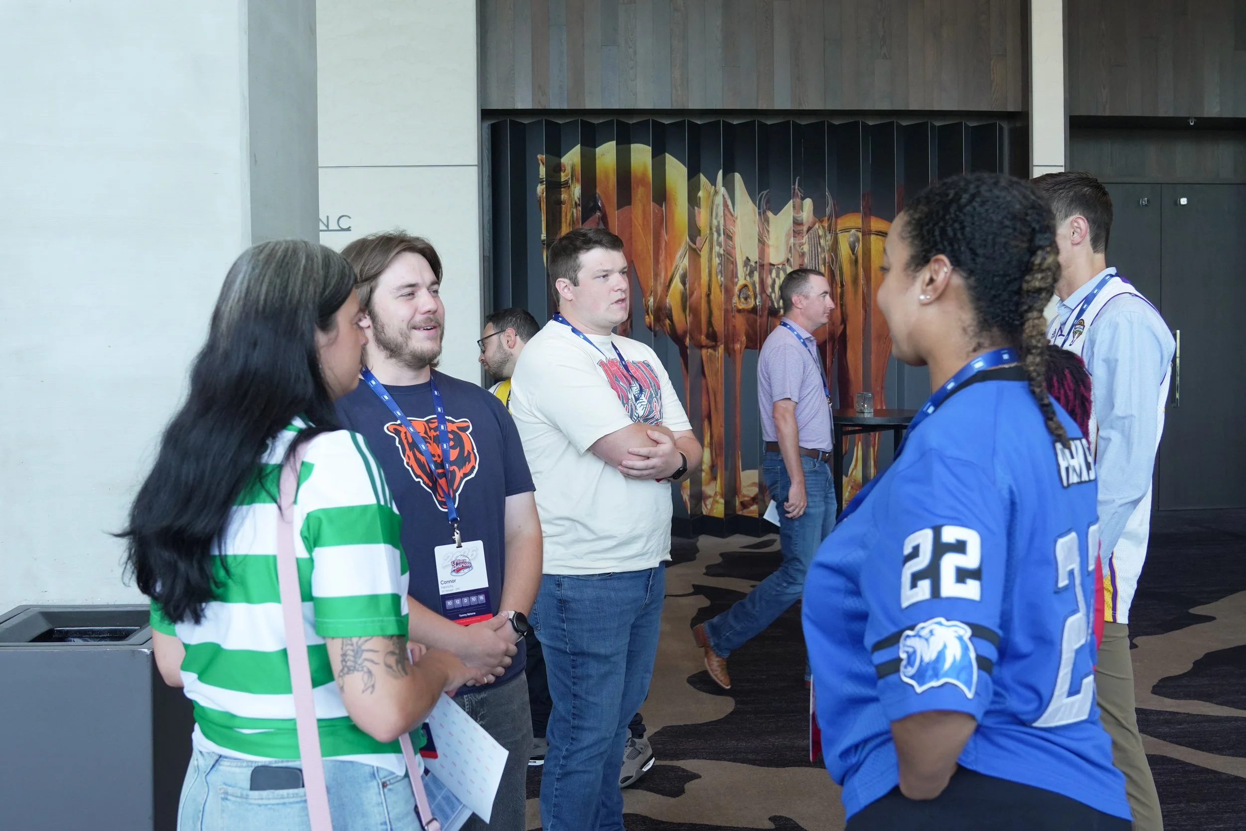 Corporate event photography of attendees networking at a Dallas conference
