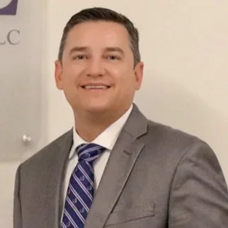 Head shot of Carl Devine