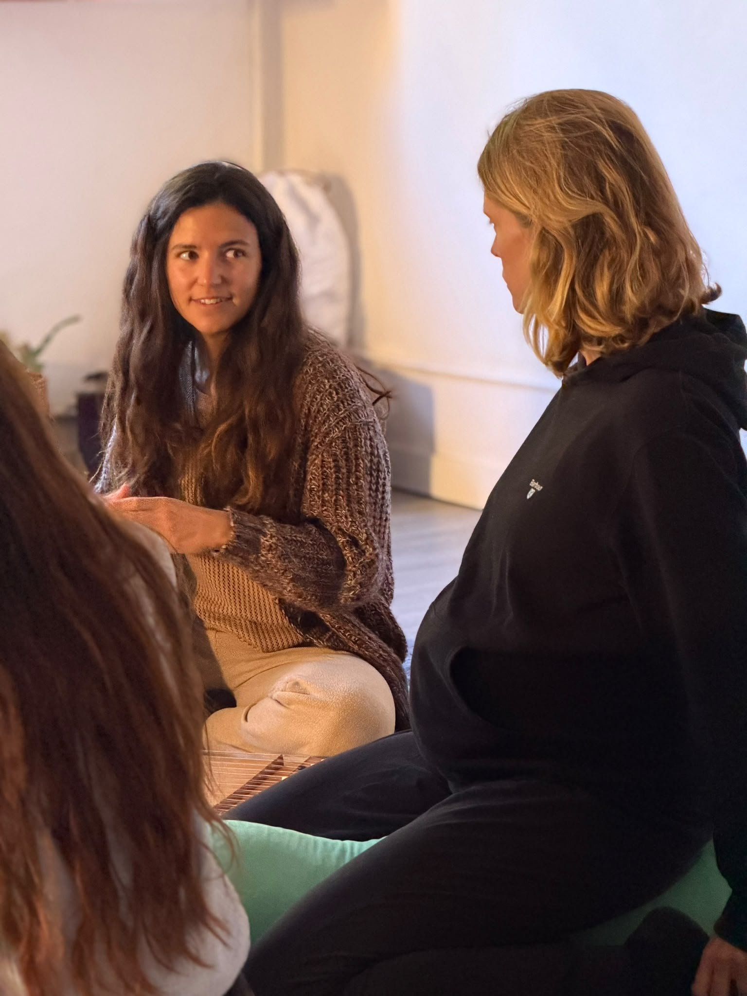Pregnant women practising safe prenatal yoga as part of Nydum’s specialist teacher training.