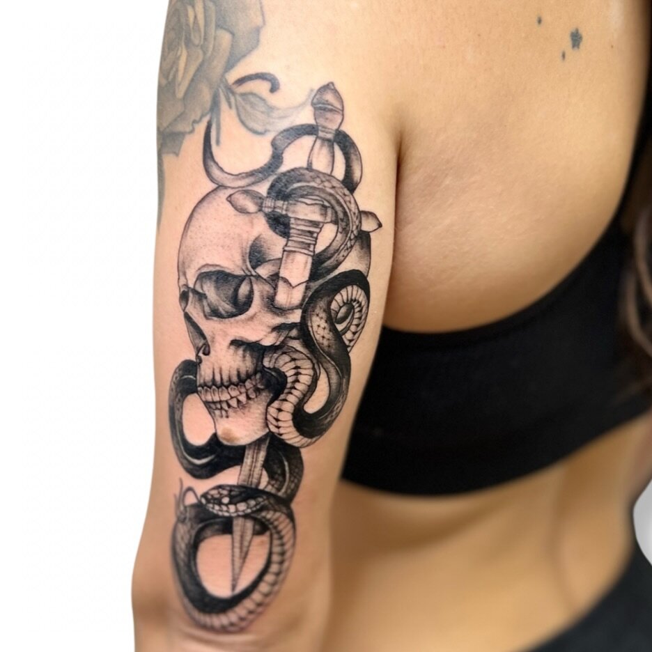 Skull + Serpent + Sword tattoo by Jen 💀🐍🗡️The detail in this piece is absolutely divine and we love the way each element works seamlessly together 🩵

Click on the link in our bio to book your next realism piece with Jen today! 

#womenintattooing