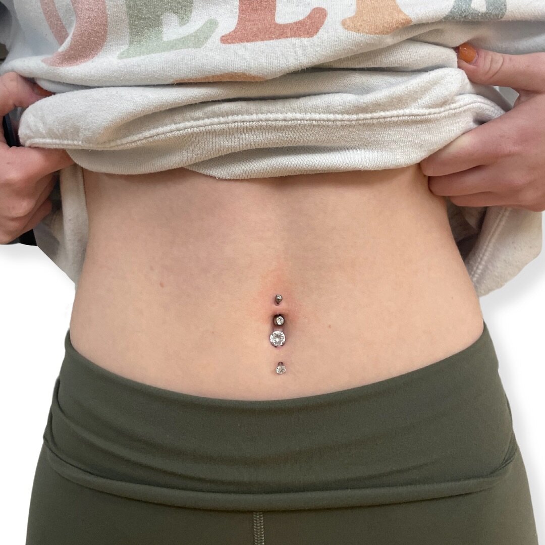Fresh Top Naval Piercing with Invictus jewelry by Christine! This piercing perfectly compliments the bottom naval piercing and we love the way this Invictus jewelry shines!

Click the link in our bio to book your naval piercing with Christine today!
