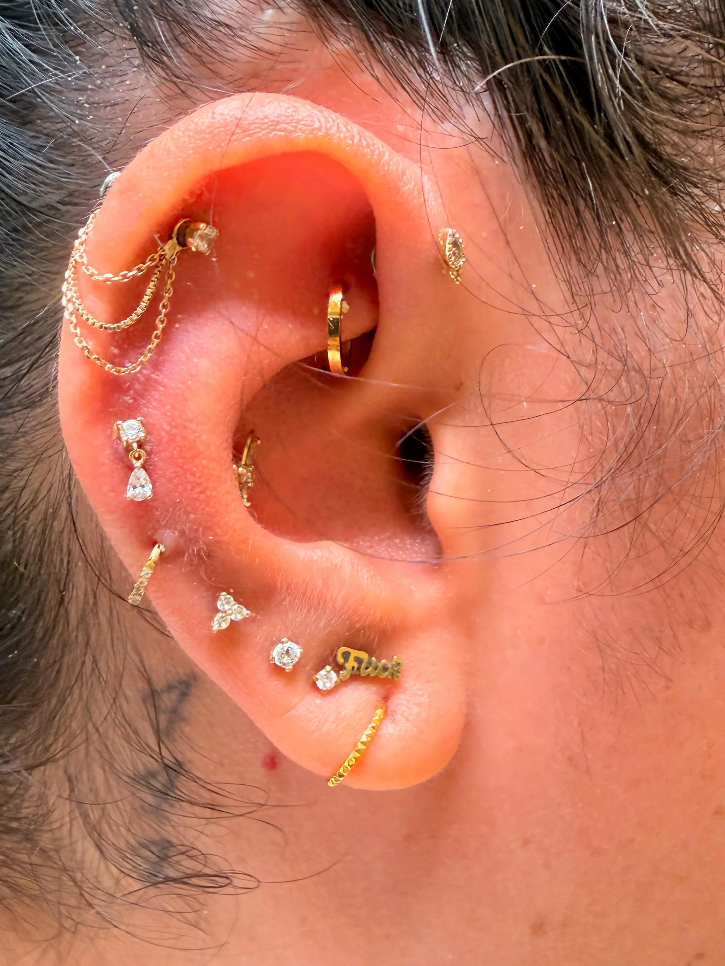 Hot girl summer isn&rsquo;t just about adding more piercings&mdash;it&rsquo;s about making them work together. ✨

Swipe to see the difference a curated ear can make. Christine took this ear from random jewelry and no real flow to a look that feels in