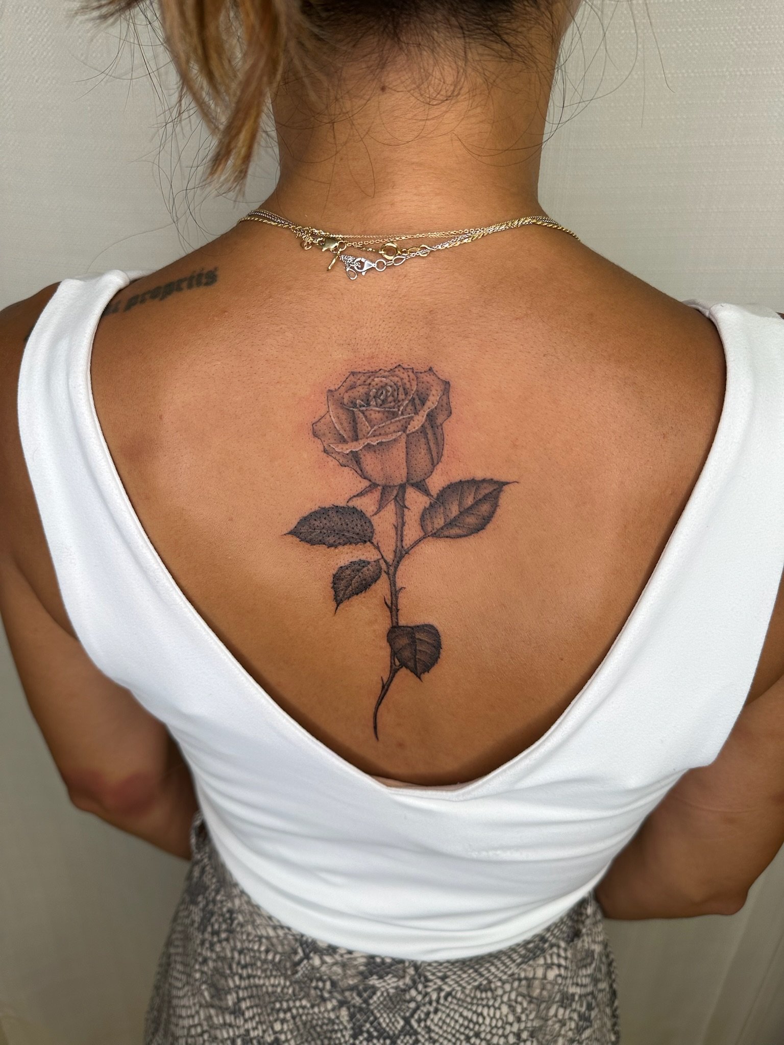 A tattoo of a rose