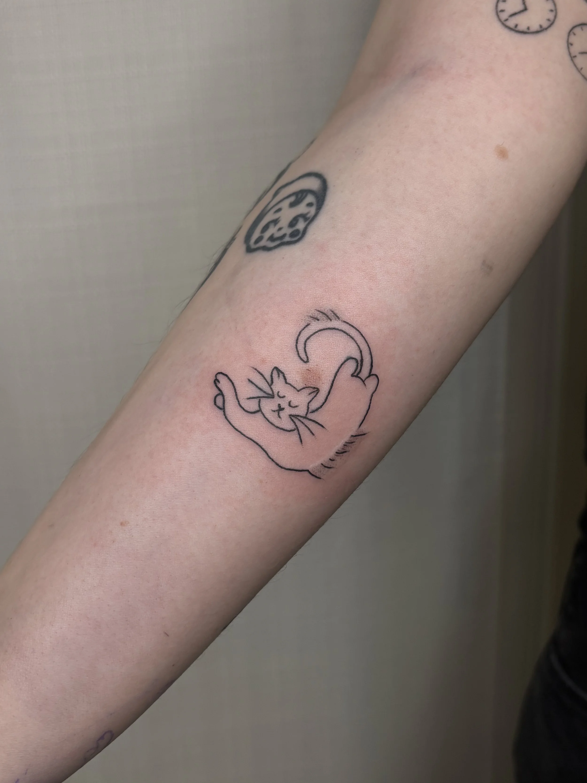 A tattoo of a cat