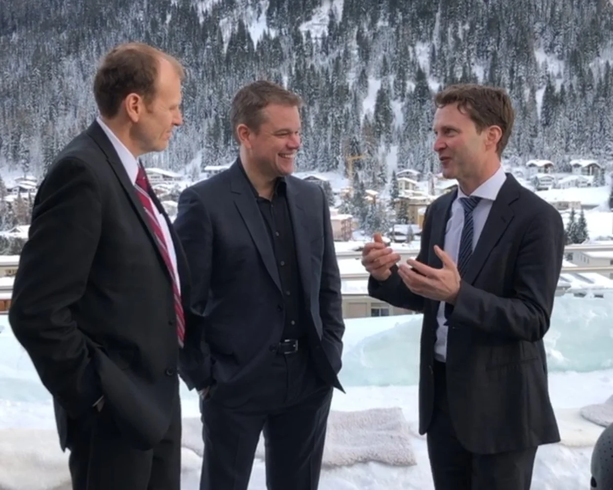 Gary White and Matt Damon of Water.Org with Paul O’Callaghan, CEO BlueTech Research filming in Davos Switzerland