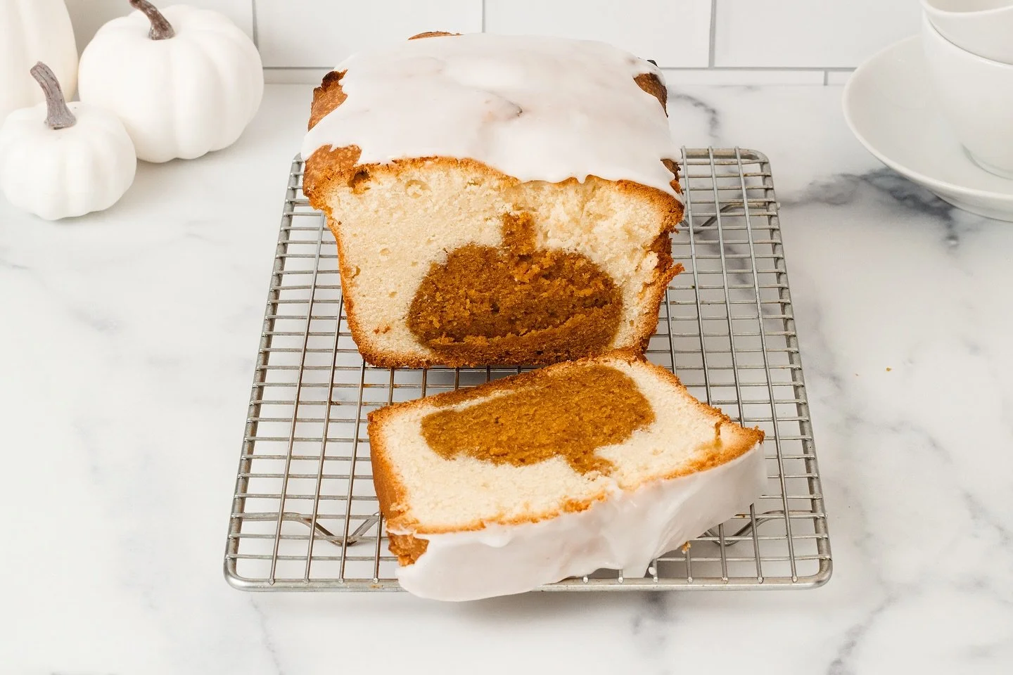This Pumpkin Surprise Cake recipe is one of my favorite pieces I created for All Recipes. A pound cake batter is stuffed with pumpkin bread pieces cut into pumpkin shapes for the perfect fall surprise! 
.
.
.
#pumpkinrecipes