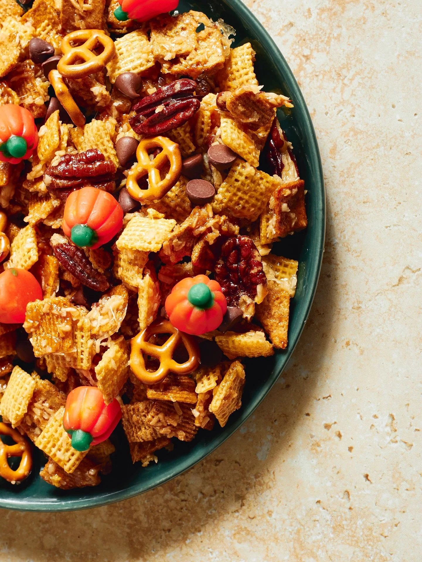 This Texas Trash Snack Mix gets a Halloween update with candy corn pumpkins! Find the recipe on Southern Living. 
.
.
.
#texastrash , Chex mix, snack mix #chexmix