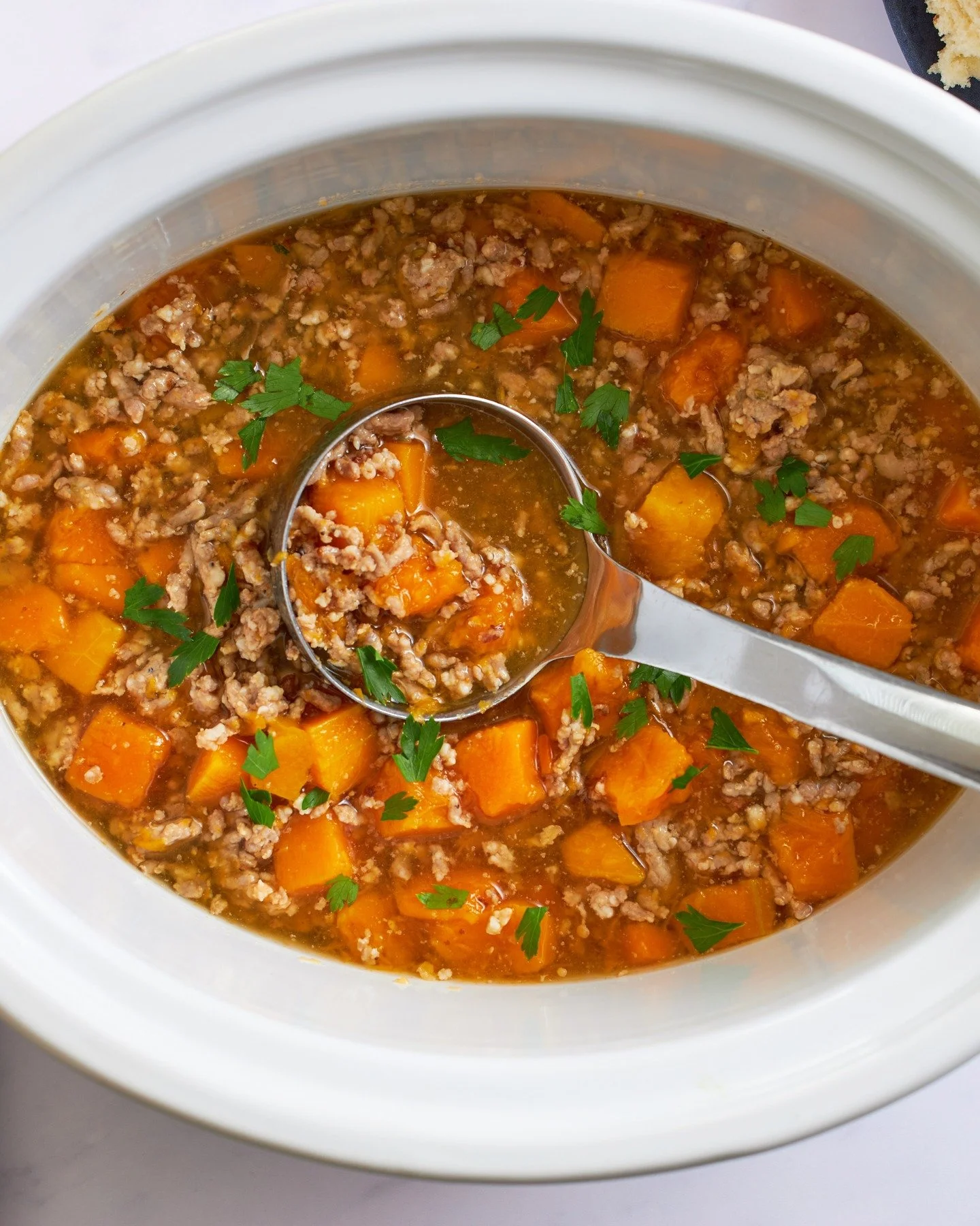 This soup starts with mild Italian sausage and a slow cooker! And it's loaded with butternut squash for cool weather cozy meal. find the recipe on simply recipes by searching: butternut squash soup.
.
.
.
easy meal, simple recipe, fall soup, winter s