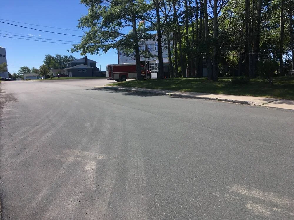 Hiram Street after - street replacement with curb and sidewalk, including partial replacement of Port Hawkesbury Volunteer Fire Department parking lot.
