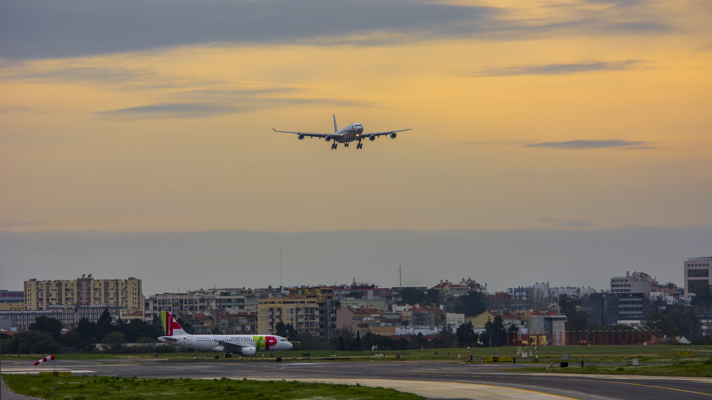 LPPT (Lisbon, Portugal) Air X Charter Airbus A340-313 On Approach And TAP Air Portugal CS-TTQ Airbus A319-111 Holding