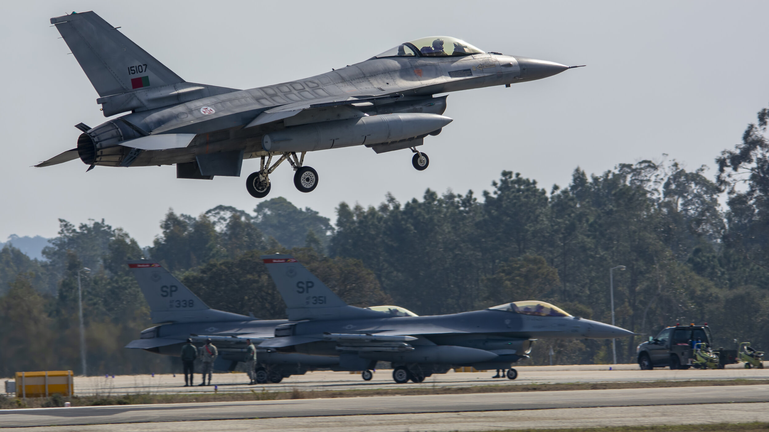 FAP BA5 Monte Real, Portugal. USAF F16s - Joint Exercise. FAP 15107 F16MLU & USAF 91-0351 & 91-0338 52nd FW Spangdahlem AB, Germany General Dynamics F-16C Fighting Falcon